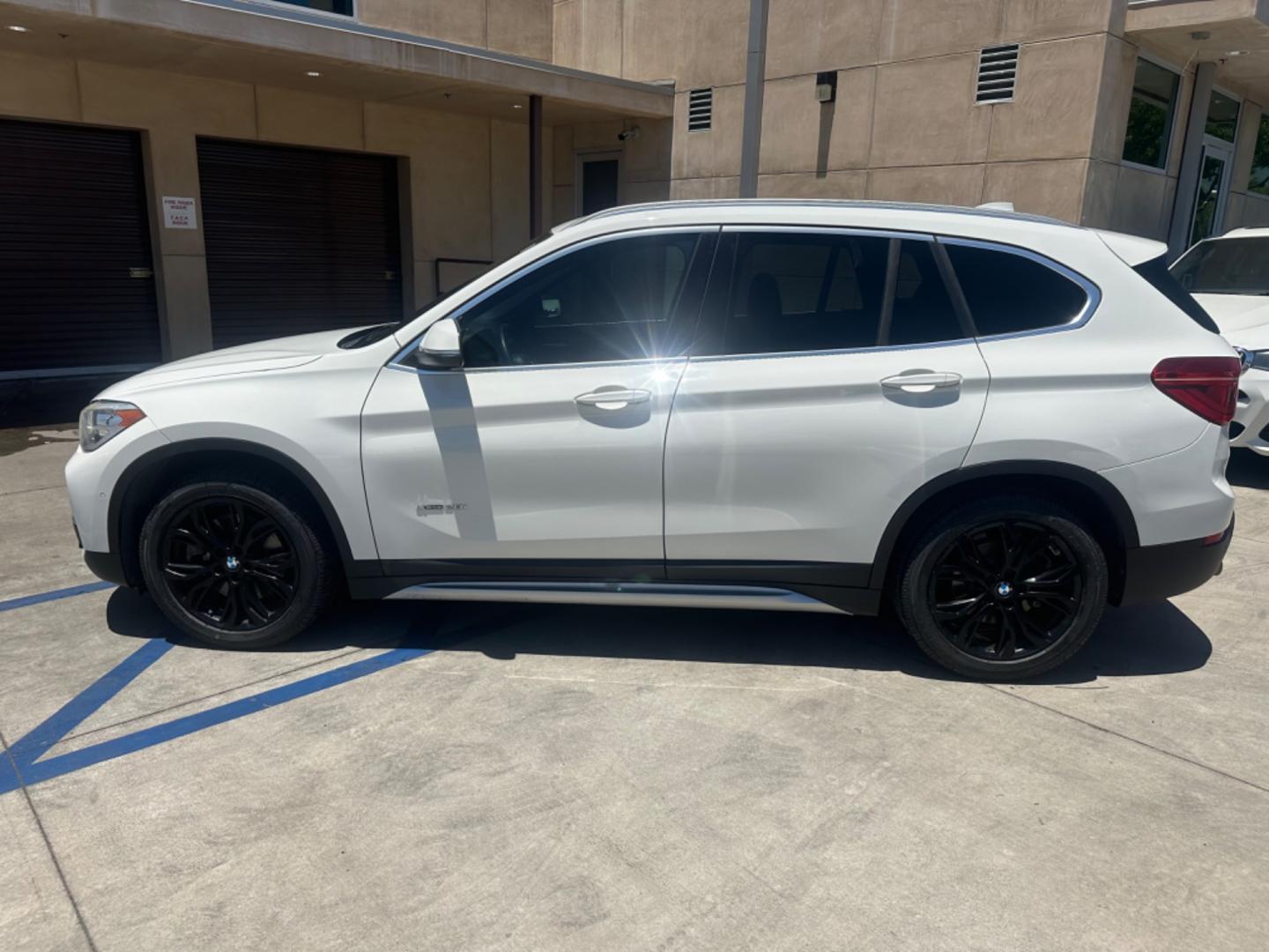 2016 WHITE /Black BMW X1 Leather (WBXHT3C30GP) with an 2.0 engine, Automatic transmission, located at 30 S. Berkeley Avenue, Pasadena, CA, 91107, (626) 248-7567, 34.145447, -118.109398 - Photo#1