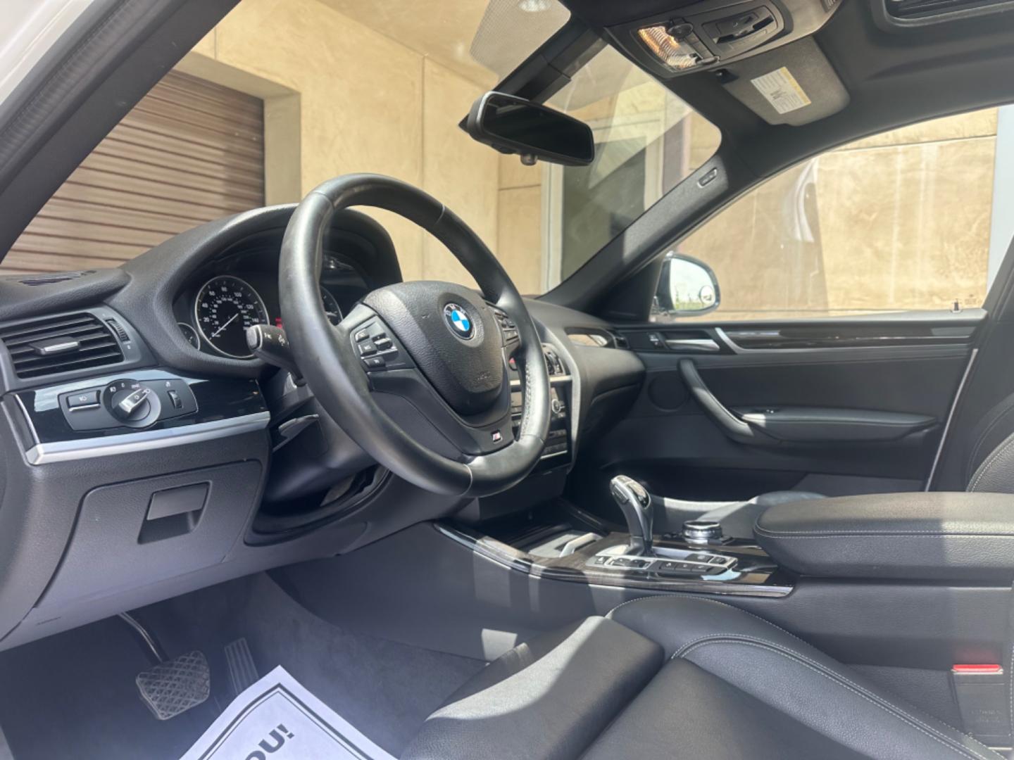 2015 Alpine White /Black BMW X4 Leather (5UXXW3C59F0) with an 2.0 engine, Automatic transmission, located at 30 S. Berkeley Avenue, Pasadena, CA, 91107, (626) 248-7567, 34.145447, -118.109398 - Discover the 2015 BMW X4 xDrive28i: Luxury Meets Affordability Are you in the market for a luxury vehicle that doesn't break the bank? Look no further than the 2015 BMW X4 xDrive28i. This impressive model offers the perfect blend of performance, style, and affordability. At our dealership, we under - Photo#16