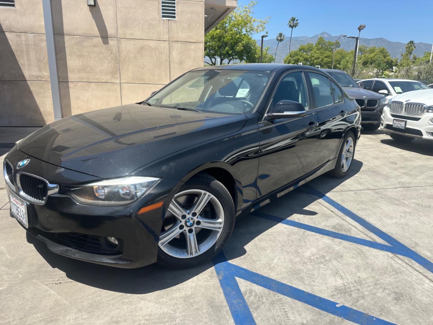 2013 Black Sapphire Metallic /Black BMW 3-Series Leather (WBA3C1C57DF) with an 2.0 engine, Automatic transmission, located at 30 S. Berkeley Avenue, Pasadena, CA, 91107, (626) 248-7567, 34.145447, -118.109398 - Photo#0