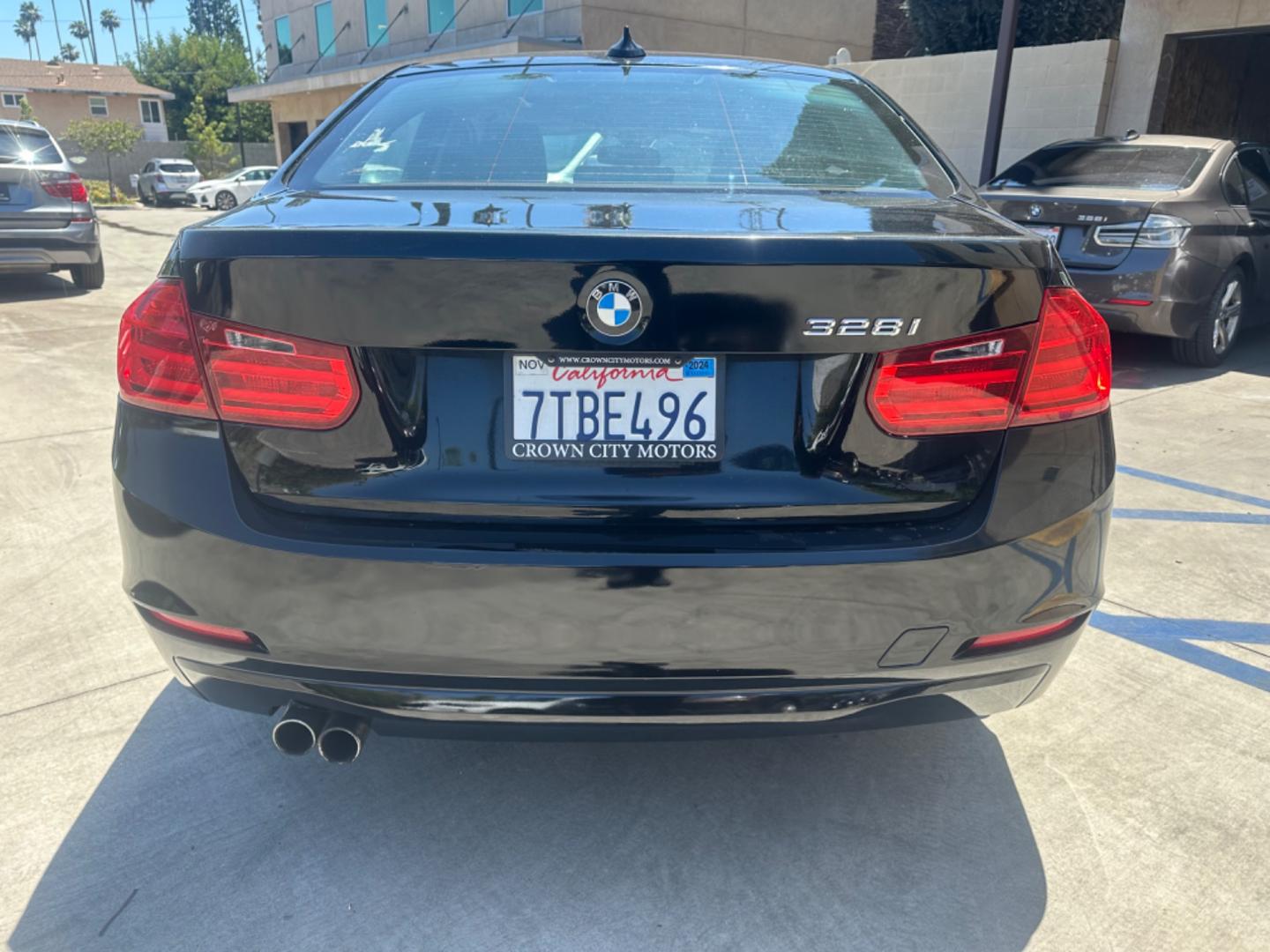 2013 Black Sapphire Metallic /Black BMW 3-Series Leather (WBA3C1C57DF) with an 2.0 engine, Automatic transmission, located at 30 S. Berkeley Avenue, Pasadena, CA, 91107, (626) 248-7567, 34.145447, -118.109398 - Photo#4