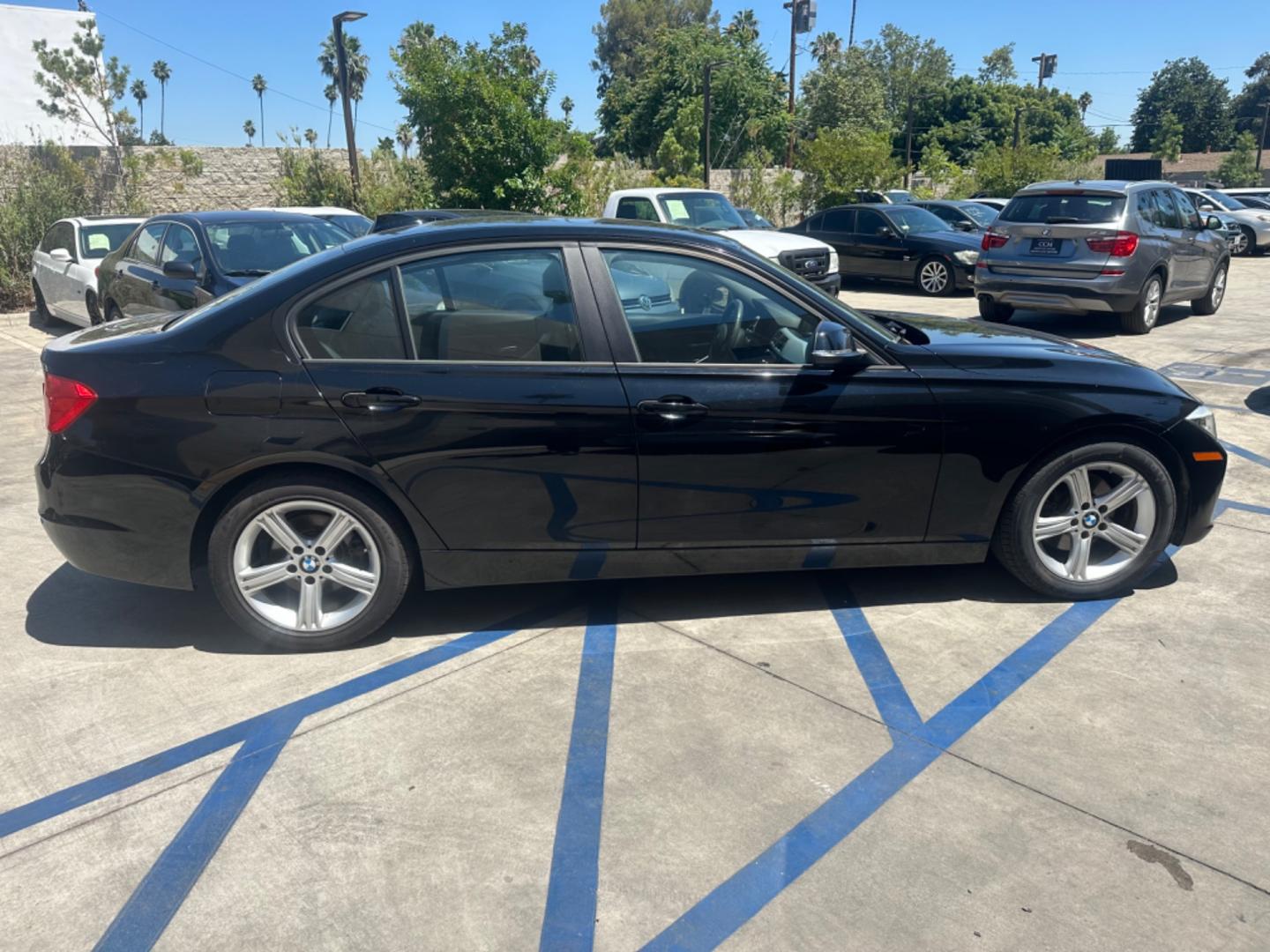 2013 Black Sapphire Metallic /Black BMW 3-Series Leather (WBA3C1C57DF) with an 2.0 engine, Automatic transmission, located at 30 S. Berkeley Avenue, Pasadena, CA, 91107, (626) 248-7567, 34.145447, -118.109398 - Photo#6