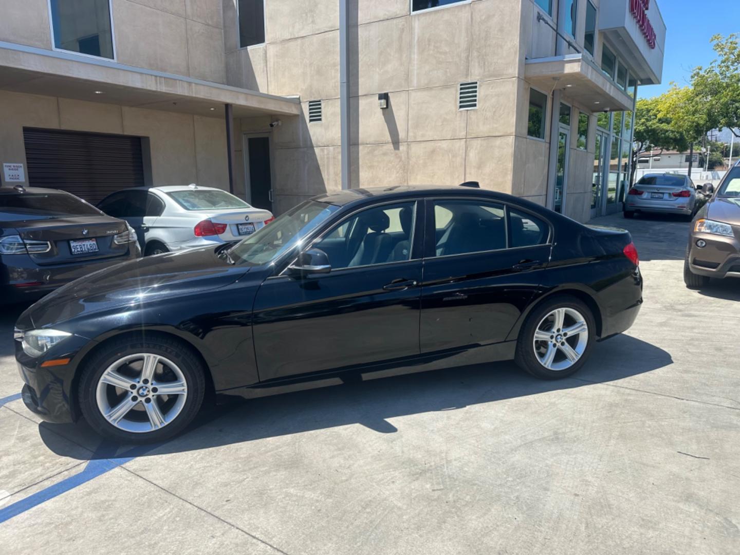 2013 Black Sapphire Metallic /Black BMW 3-Series Leather (WBA3C1C57DF) with an 2.0 engine, Automatic transmission, located at 30 S. Berkeley Avenue, Pasadena, CA, 91107, (626) 248-7567, 34.145447, -118.109398 - Photo#2