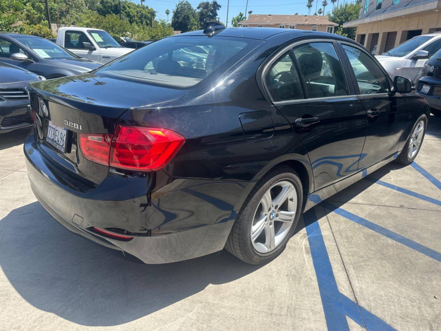 2013 Black Sapphire Metallic /Black BMW 3-Series Leather (WBA3C1C57DF) with an 2.0 engine, Automatic transmission, located at 30 S. Berkeley Avenue, Pasadena, CA, 91107, (626) 248-7567, 34.145447, -118.109398 - Photo#5