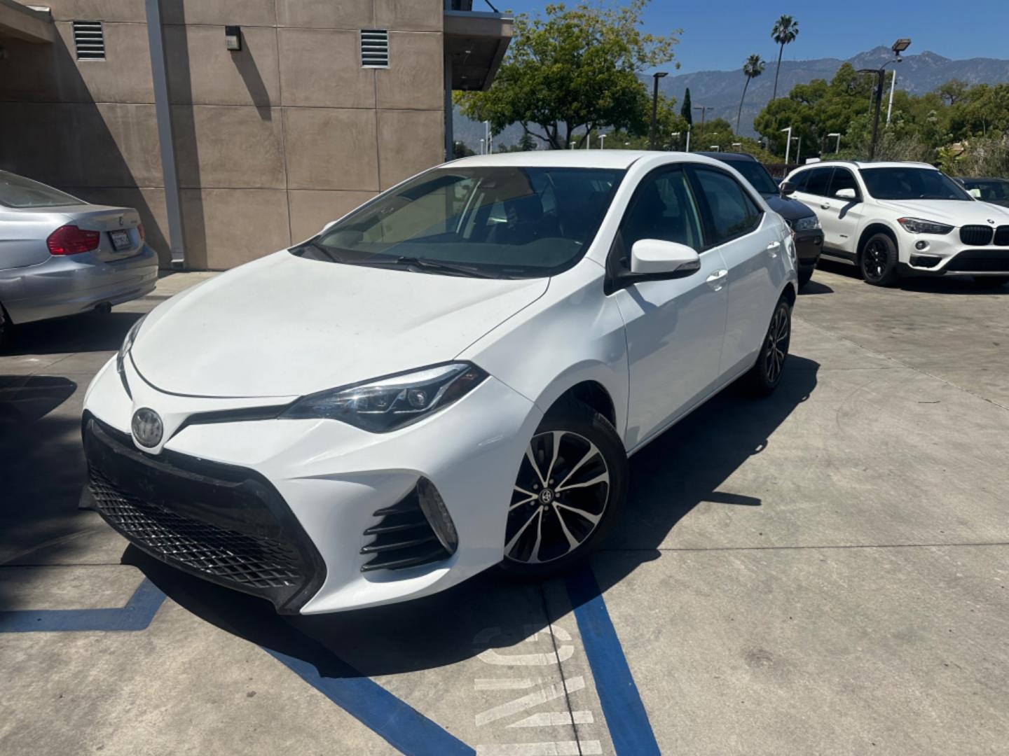 2017 WHITE /Black Toyota Corolla Cloth (2T1BURHE2HC) with an 4 Cylinder engine, Automatic transmission, located at 30 S. Berkeley Avenue, Pasadena, CA, 91107, (626) 248-7567, 34.145447, -118.109398 - Photo#0