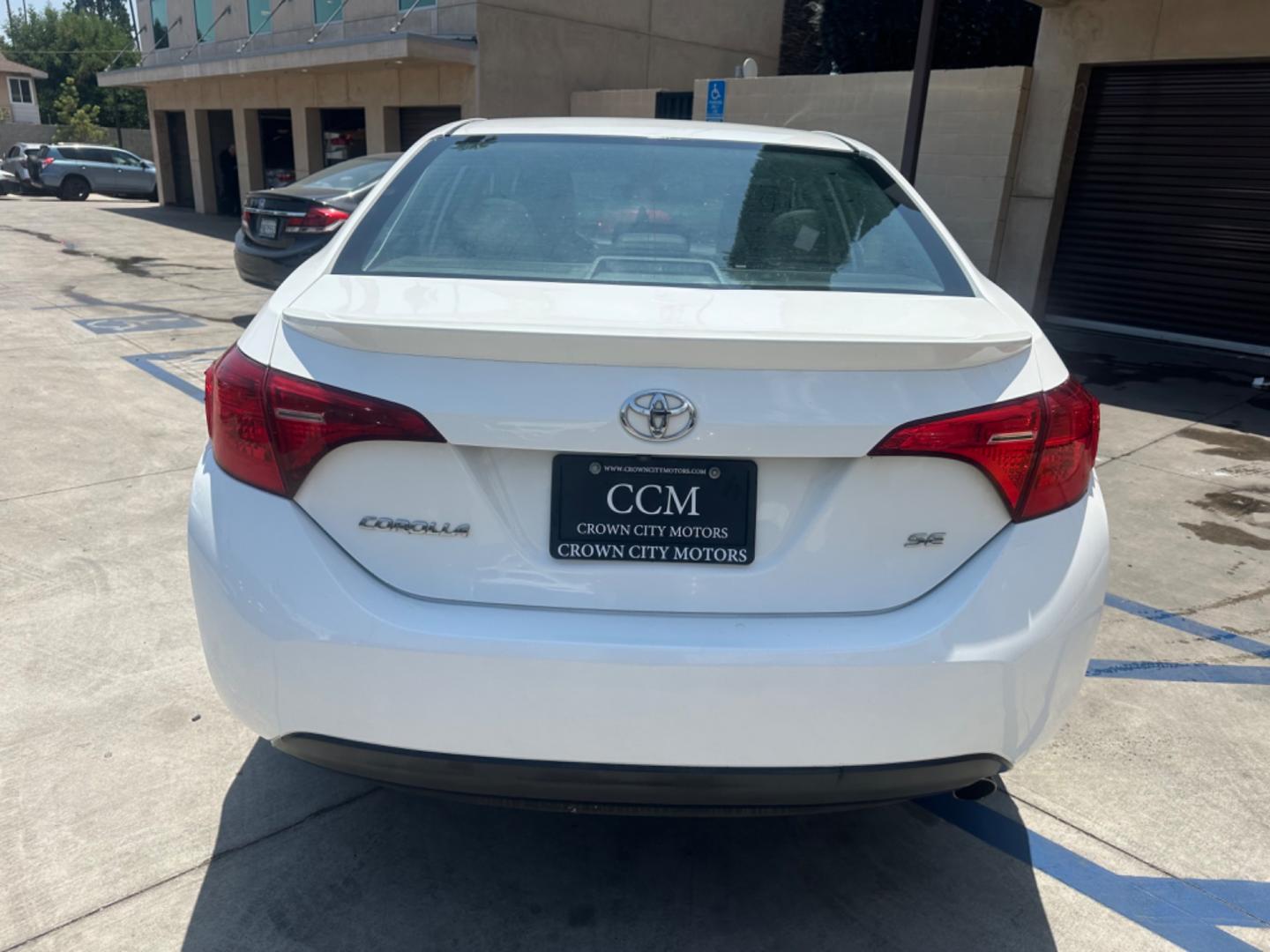 2017 WHITE /Black Toyota Corolla Cloth (2T1BURHE2HC) with an 4 Cylinder engine, Automatic transmission, located at 30 S. Berkeley Avenue, Pasadena, CA, 91107, (626) 248-7567, 34.145447, -118.109398 - Photo#4