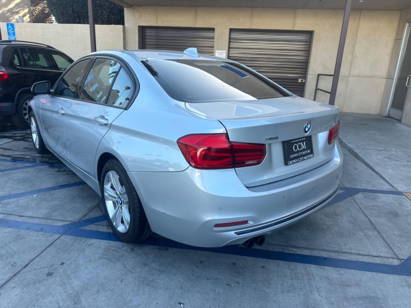 2016 Silver Metallic /Black BMW 3-Series (WBA8E3G50GN) , located at 30 S. Berkeley Avenue, Pasadena, CA, 91107, (626) 248-7567, 34.145447, -118.109398 - Navigation!! Monn-roof!! Back-up camera! Discover the 2016 BMW 328 xDrive with Navigation, Back-Up Camera, and More! Are you in the market for cheap cars or affordable cars that combine luxury, performance, and advanced features? Look no further than the 2016 BMW 328 xDrive, a remarkable vehicle - Photo#3