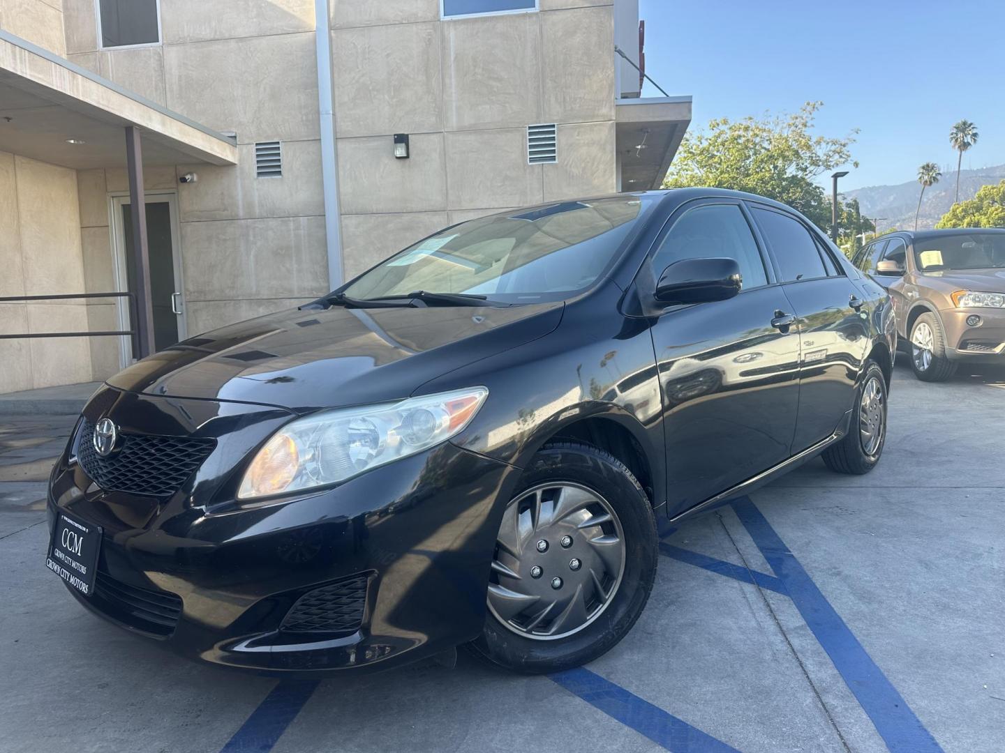 2010 Black /Gray Toyota Corolla Cloth (JTDBU4EE7A9) with an 4 Cylinder engine, Automatic transmission, located at 30 S. Berkeley Avenue, Pasadena, CA, 91107, (626) 248-7567, 34.145447, -118.109398 - MPG! This Corolla looks and drives well. - Photo#3