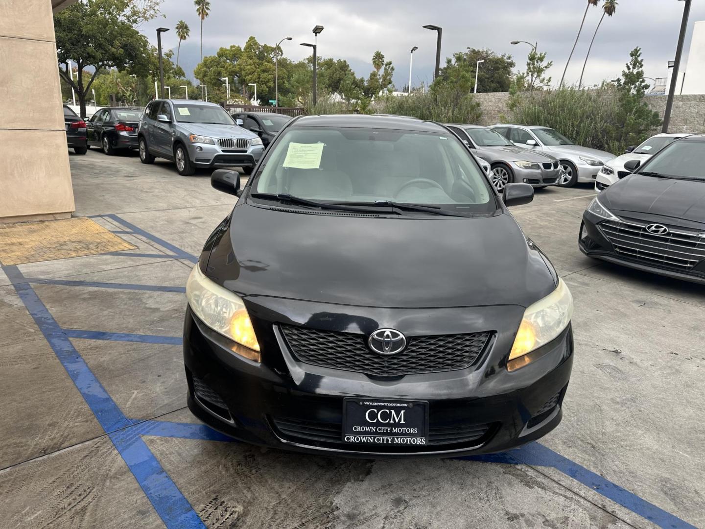 2010 Black /Gray Toyota Corolla Cloth (JTDBU4EE7A9) with an 4 Cylinder engine, Automatic transmission, located at 30 S. Berkeley Avenue, Pasadena, CA, 91107, (626) 248-7567, 34.145447, -118.109398 - MPG! This Corolla looks and drives well. - Photo#25