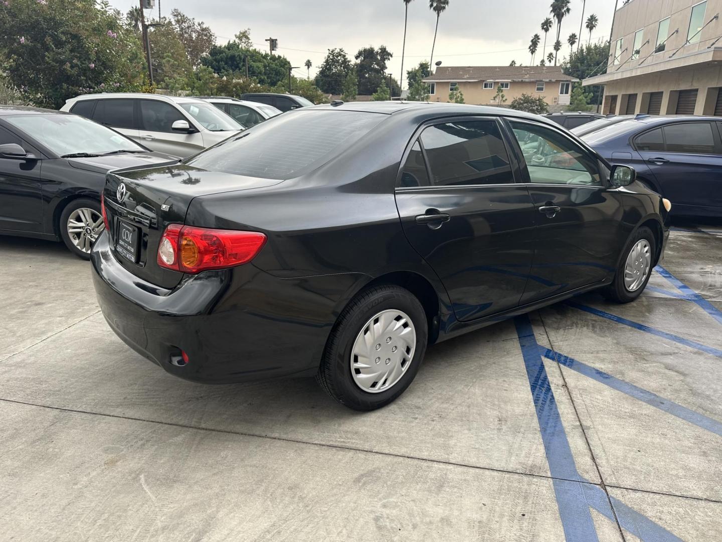 2010 Black /Gray Toyota Corolla Cloth (JTDBU4EE7A9) with an 4 Cylinder engine, Automatic transmission, located at 30 S. Berkeley Avenue, Pasadena, CA, 91107, (626) 248-7567, 34.145447, -118.109398 - MPG! This Corolla looks and drives well. - Photo#4