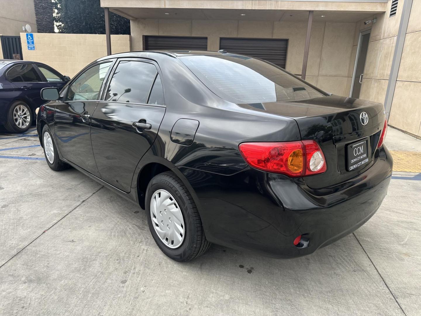 2010 Black /Gray Toyota Corolla Cloth (JTDBU4EE7A9) with an 4 Cylinder engine, Automatic transmission, located at 30 S. Berkeley Avenue, Pasadena, CA, 91107, (626) 248-7567, 34.145447, -118.109398 - MPG! This Corolla looks and drives well. - Photo#2