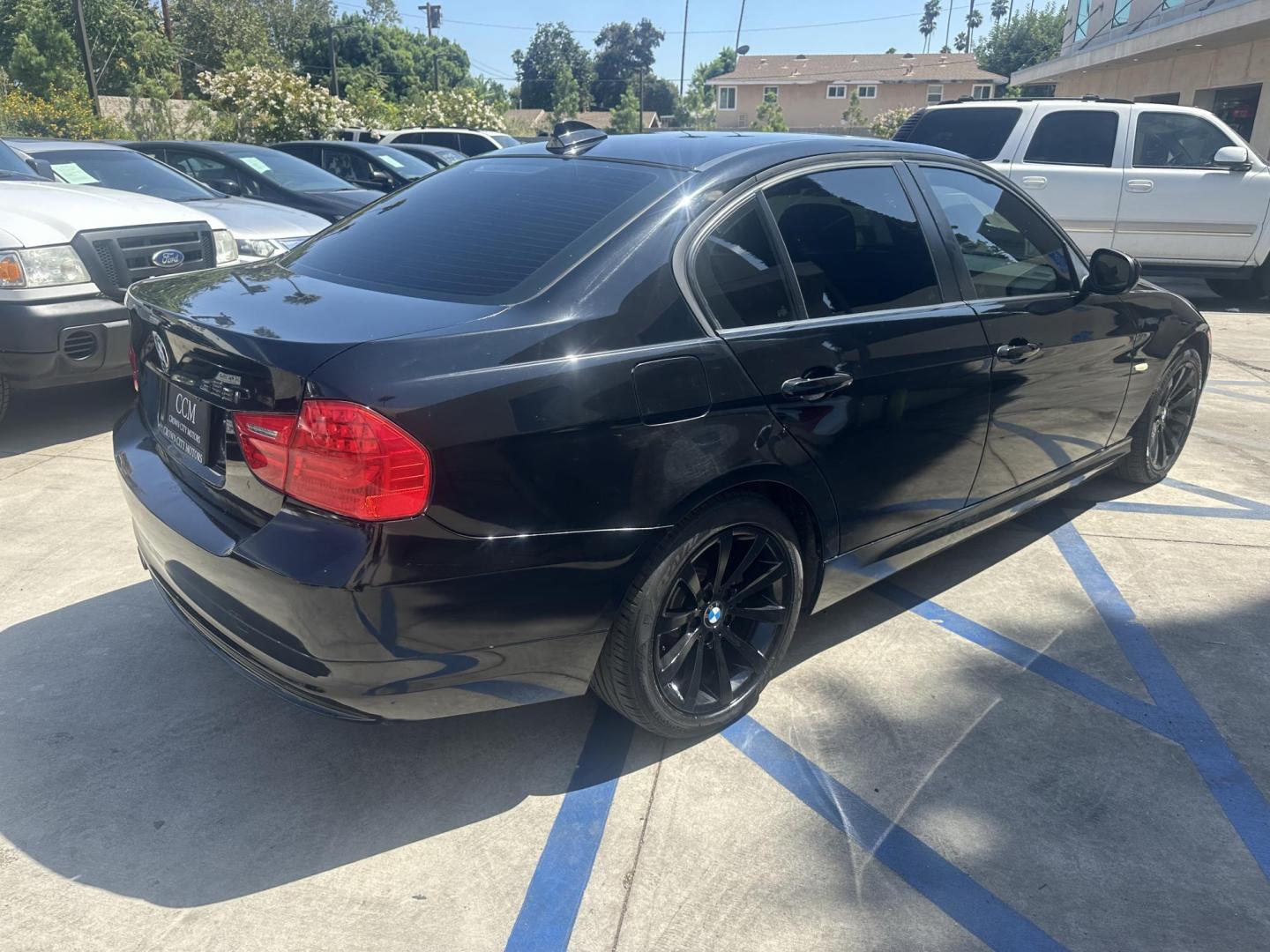 2011 Black Sapphire Metallic /BLACK BMW 3-Series leather (WBAPH5G57BN) with an Inline 6 engine, Automatic transmission, located at 30 S. Berkeley Avenue, Pasadena, CA, 91107, (626) 248-7567, 34.145447, -118.109398 - Photo#5