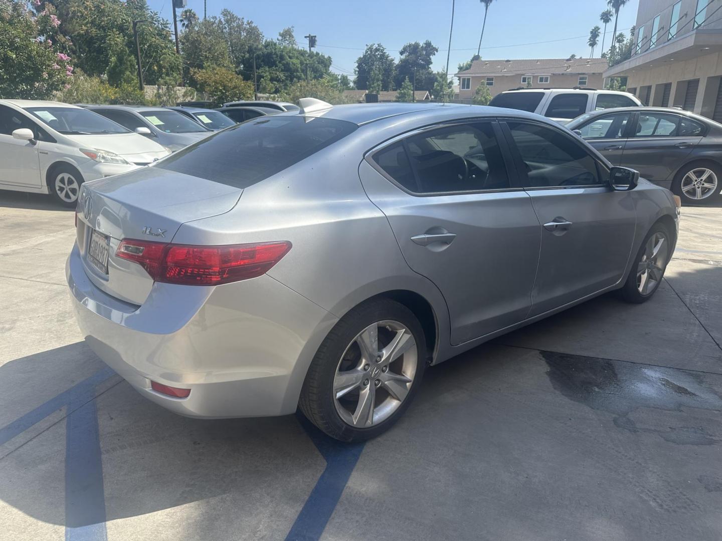 2013 /Black Acura ILX 5-Spd AT w/ Premium Package (19VDE1F59DE) with an 2.0L L4 16V DOHC engine, 5-Speed Automatic transmission, located at 30 S. Berkeley Avenue, Pasadena, CA, 91107, (626) 248-7567, 34.145447, -118.109398 - 2013 Acura ILX – Low Miles, Affordable Luxury, and Easy Financing Options Overview: Step into luxury and reliability with this 2013 Acura ILX, a compact sedan that perfectly blends performance, comfort, and technology. This particular model stands out with its low mileage of just 81,761 miles, m - Photo#4