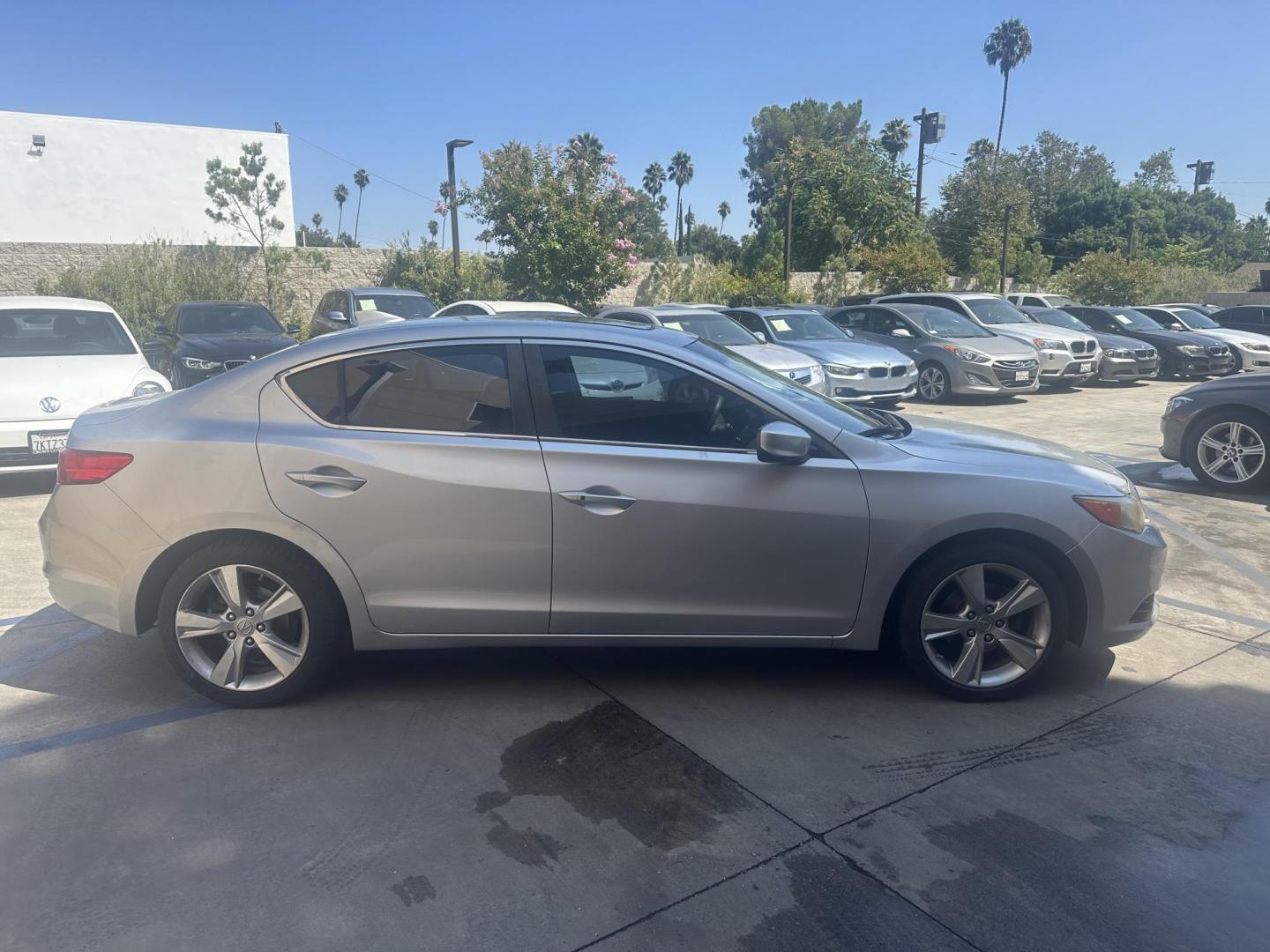 2013 /Black Acura ILX 5-Spd AT w/ Premium Package (19VDE1F59DE) with an 2.0L L4 16V DOHC engine, 5-Speed Automatic transmission, located at 30 S. Berkeley Avenue, Pasadena, CA, 91107, (626) 248-7567, 34.145447, -118.109398 - 2013 Acura ILX – Low Miles, Affordable Luxury, and Easy Financing Options Overview: Step into luxury and reliability with this 2013 Acura ILX, a compact sedan that perfectly blends performance, comfort, and technology. This particular model stands out with its low mileage of just 81,761 miles, m - Photo#5