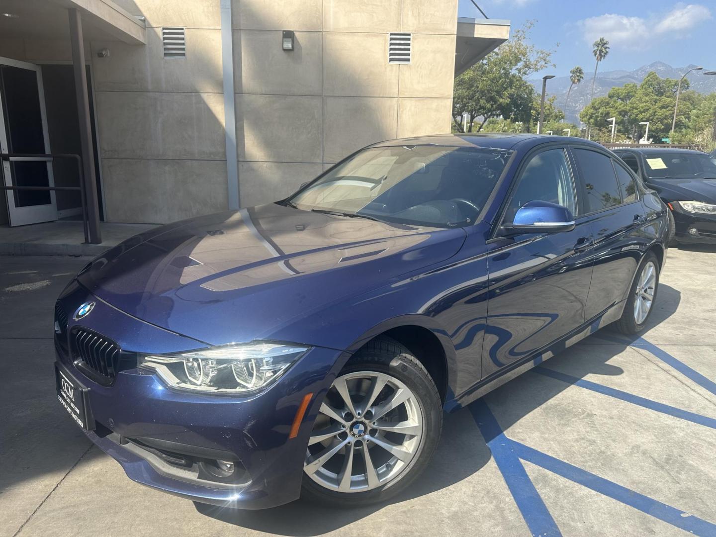 2018 Estoril Blue /Black BMW 3-Series 320i Sedan (WBA8E1G59JN) with an 2.0L L4 DOHC 16V engine, 8A transmission, located at 30 S. Berkeley Avenue, Pasadena, CA, 91107, (626) 248-7567, 34.145447, -118.109398 - Discover the 2018 BMW 320i: Style, Performance, and Luxury for Every Driver If you're seeking a sophisticated luxury sedan that combines style, performance, and advanced features, look no further than the 2018 BMW 320i. This model, part of BMW’s renowned 3-Series, is the epitome of elegance and d - Photo#0