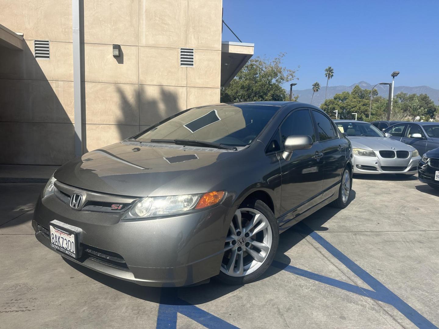 2007 Silver Metallic /Gray Honda Civic Si Sedan (2HGFA55547H) with an 2.0L L4 DOHC 16V engine, 6-Speed Manual Overdrive transmission, located at 30 S. Berkeley Avenue, Pasadena, CA, 91107, (626) 248-7567, 34.145447, -118.109398 - New Paint! New Tires! This 2007 Honda Civic Si Sedan looks and drives well. Drive Home a Stylish 2007 Honda Civic Si 4-Door Sedan with New Paint and Tires – Available at Our Buy Here Pay Here Dealer with Bad Credit Auto Loan Financing! Looking for a sleek and sporty sedan that’s perfect for - Photo#0