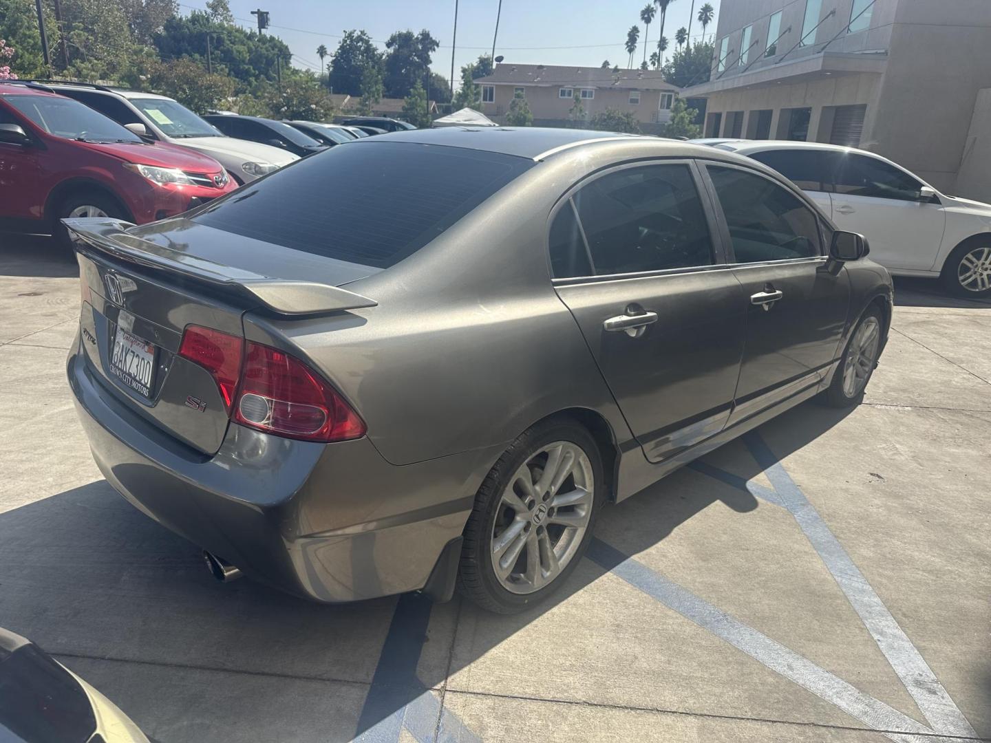 2007 Silver Metallic /Gray Honda Civic Si Sedan (2HGFA55547H) with an 2.0L L4 DOHC 16V engine, 6-Speed Manual Overdrive transmission, located at 30 S. Berkeley Avenue, Pasadena, CA, 91107, (626) 248-7567, 34.145447, -118.109398 - New Paint! New Tires! This 2007 Honda Civic Si Sedan looks and drives well. Drive Home a Stylish 2007 Honda Civic Si 4-Door Sedan with New Paint and Tires – Available at Our Buy Here Pay Here Dealer with Bad Credit Auto Loan Financing! Looking for a sleek and sporty sedan that’s perfect for - Photo#7