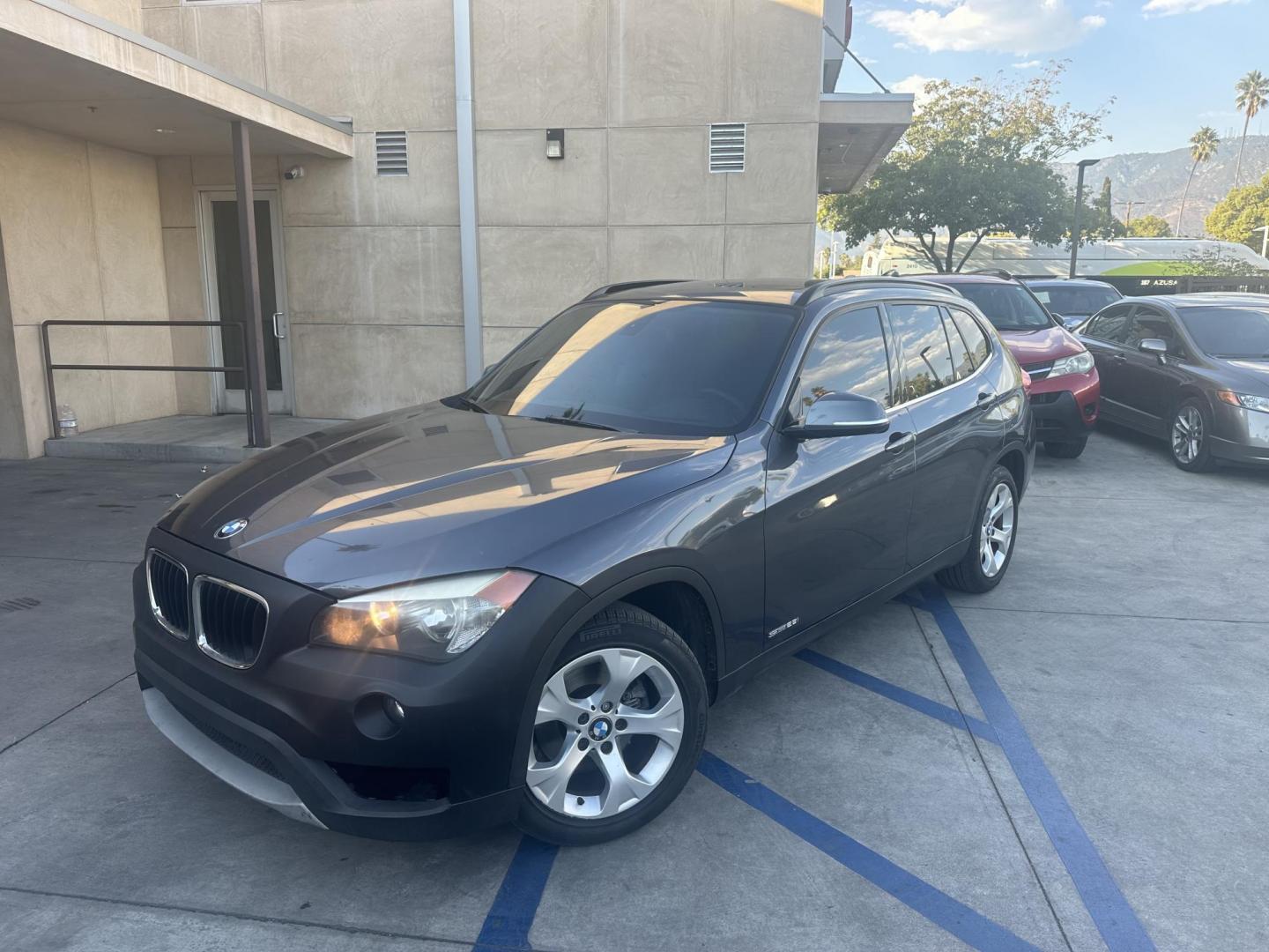 2013 Mineral Gray Metallic /Black BMW X1 sDrive28i (WBAVM1C59DV) with an 2.0L L4 DOHC 16V engine, 8-Speed Automatic transmission, located at 30 S. Berkeley Avenue, Pasadena, CA, 91107, (626) 248-7567, 34.145447, -118.109398 - Photo#0