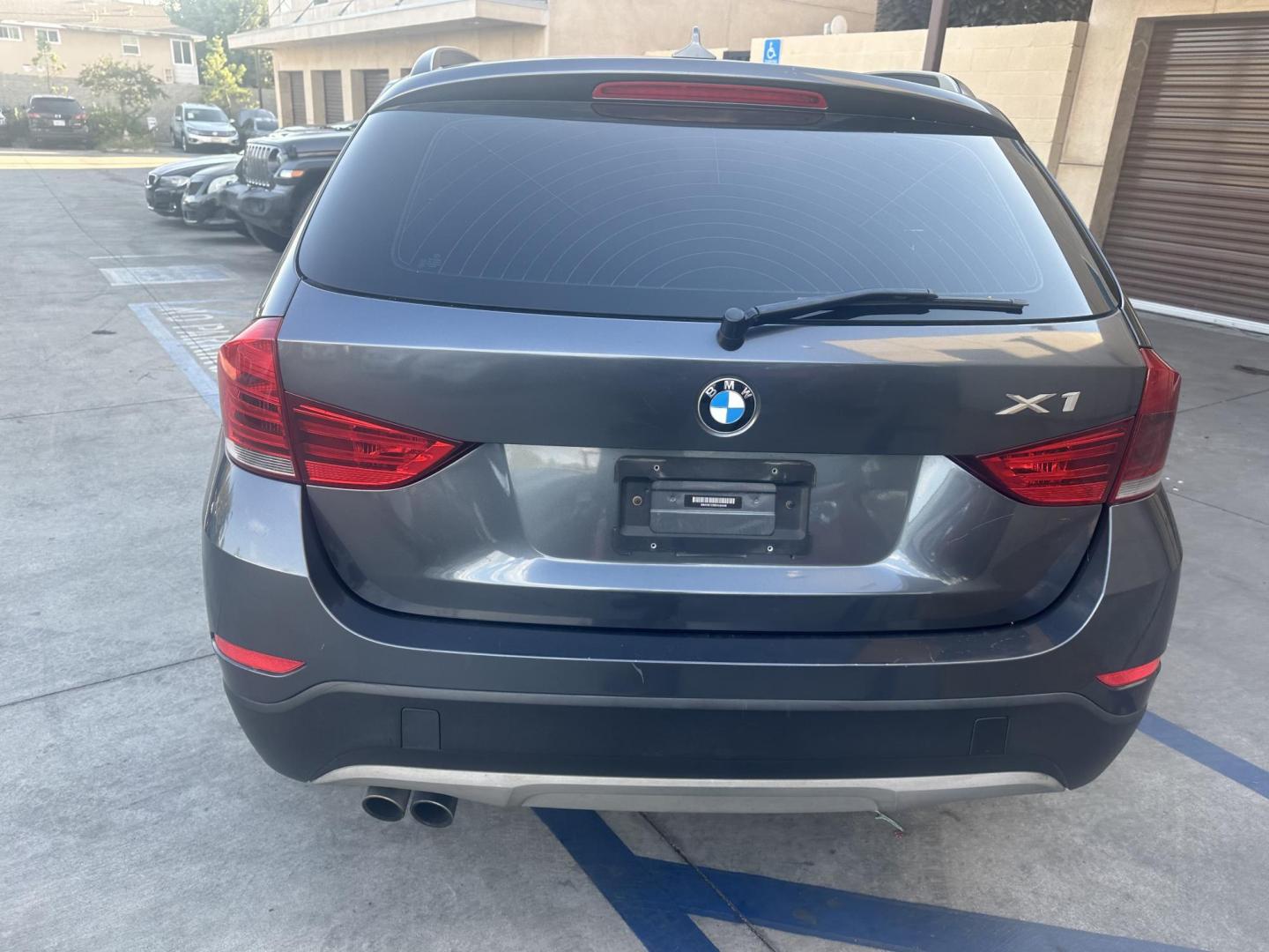 2013 Mineral Gray Metallic /Black BMW X1 sDrive28i (WBAVM1C59DV) with an 2.0L L4 DOHC 16V engine, 8-Speed Automatic transmission, located at 30 S. Berkeley Avenue, Pasadena, CA, 91107, (626) 248-7567, 34.145447, -118.109398 - Photo#3