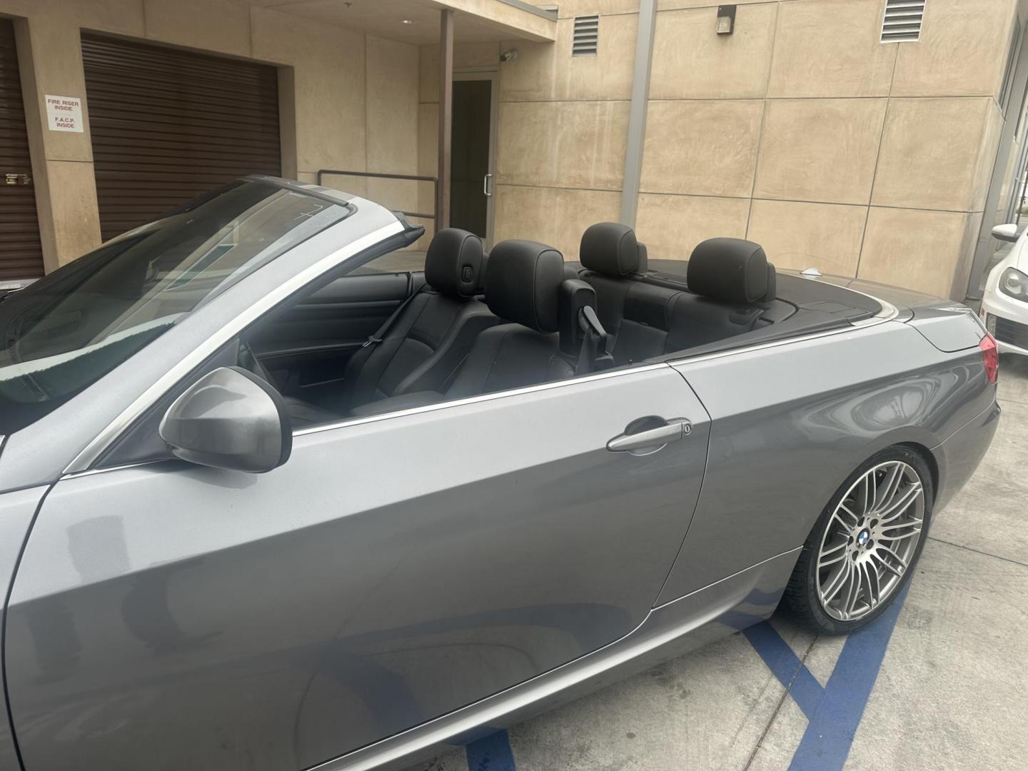 2013 Space Gray Metallic /Black BMW 3-Series 335i Convertible (WBADX7C56DJ) with an 3.0L L6 DOHC 24V engine, Automatic transmission, located at 30 S. Berkeley Avenue, Pasadena, CA, 91107, (626) 248-7567, 34.145447, -118.109398 - Photo#16