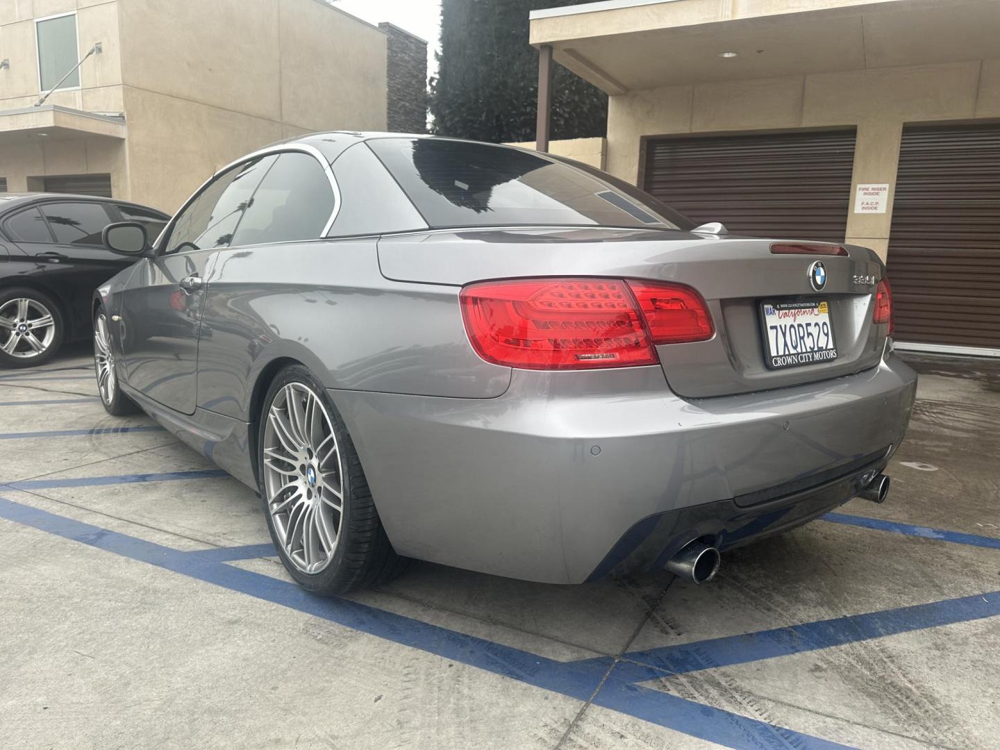 2013 Space Gray Metallic /Black BMW 3-Series 335i Convertible (WBADX7C56DJ) with an 3.0L L6 DOHC 24V engine, Automatic transmission, located at 30 S. Berkeley Avenue, Pasadena, CA, 91107, (626) 248-7567, 34.145447, -118.109398 - Photo#2