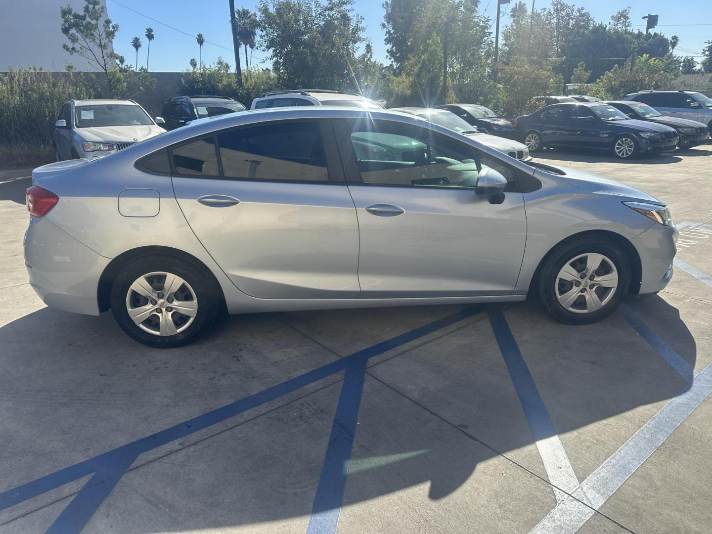 2017 Arctic Blue Metallic. /Gray Chevrolet Cruze LS Auto (1G1BC5SM8H7) with an 1.4L L4 DOHC 16V TURBO engine, 6A transmission, located at 30 S. Berkeley Avenue, Pasadena, CA, 91107, (626) 248-7567, 34.145447, -118.109398 - 017 Chevrolet Cruze: The Compact Car That Delivers Style, Efficiency, and Comfort The 2017 Chevrolet Cruze offers a perfect blend of style, efficiency, and modern technology, making it one of the most popular compact cars in its class. Whether you're looking for a daily commuter or a vehicle that - Photo#11