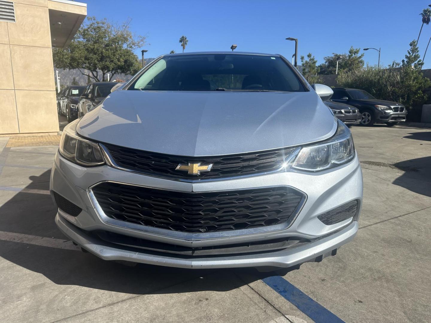 2017 Arctic Blue Metallic. /Gray Chevrolet Cruze LS Auto (1G1BC5SM8H7) with an 1.4L L4 DOHC 16V TURBO engine, 6A transmission, located at 30 S. Berkeley Avenue, Pasadena, CA, 91107, (626) 248-7567, 34.145447, -118.109398 - 017 Chevrolet Cruze: The Compact Car That Delivers Style, Efficiency, and Comfort The 2017 Chevrolet Cruze offers a perfect blend of style, efficiency, and modern technology, making it one of the most popular compact cars in its class. Whether you're looking for a daily commuter or a vehicle that - Photo#12