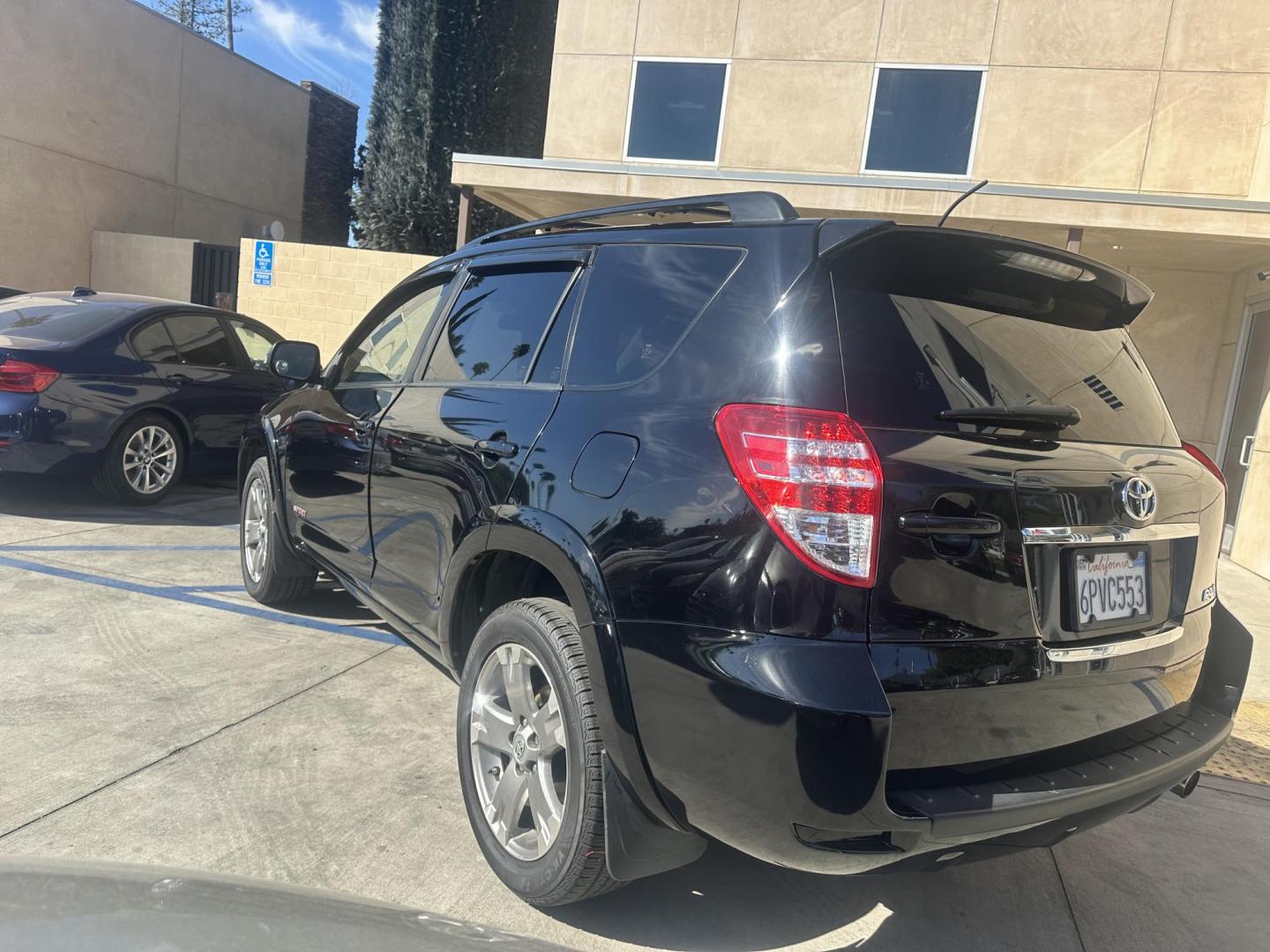 2011 Black /Black Toyota RAV4 Sport I4 2WD (JTMWF4DV0B5) with an 2.4L L4 DOHC 16V engine, 4-Speed Automatic transmission, located at 30 S. Berkeley Avenue, Pasadena, CA, 91107, (626) 248-7567, 34.145447, -118.109398 - f you're looking for a compact SUV that combines reliability, comfort, and performance, the 2011 Toyota RAV4 is an excellent choice. With a strong reputation for durability, this vehicle is perfect for individuals and families alike, offering enough room for passengers and cargo without sacrificing - Photo#2