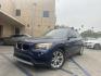 2013 Deep Sea Blue Metallic /Black BMW X1 xDrive28i (WBAVL1C56DV) with an 2.0L L4 DOHC 16V engine, 8-Speed Automatic transmission, located at 30 S. Berkeley Avenue, Pasadena, CA, 91107, (626) 248-7567, 34.145447, -118.109398 - 2013 BMW X1: Luxury, Performance, and Affordable Bad Credit Financing at Buy Here Pay Here Dealerships The 2013 BMW X1 is a luxury compact SUV that offers the perfect combination of sportiness, premium comfort, and advanced technology. As part of BMW’s well-regarded X Series, the X1 stands out - Photo#0