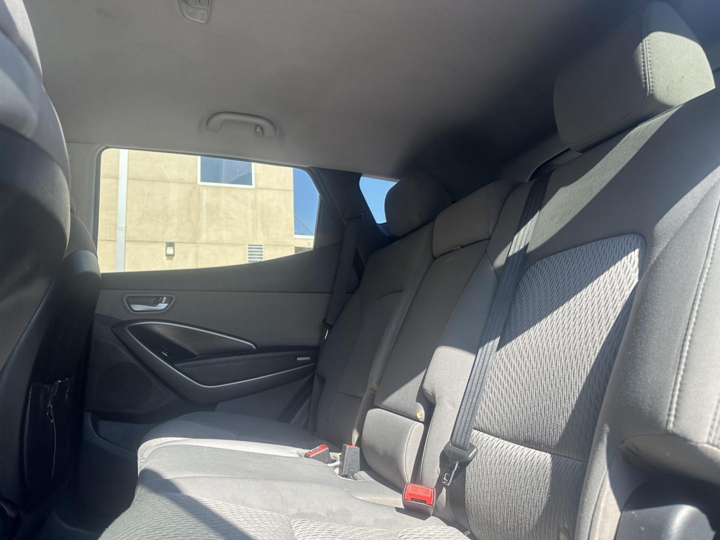 2014 Night Sky Pearl. /Gray Hyundai Santa Fe Sport 2.4 FWD (5XYZT3LB4EG) with an 2.4L L4 DOHC 16V engine, 6-Speed Automatic transmission, located at 30 S. Berkeley Avenue, Pasadena, CA, 91107, (626) 248-7567, 34.145447, -118.109398 - 2014 Hyundai Santa Fe Sport FWD 2.4: Versatility, Comfort, and Affordable Bad Credit Financing at Buy Here Pay Here Dealerships The 2014 Hyundai Santa Fe Sport FWD 2.4 is an exceptional midsize SUV that offers a balance of power, comfort, and affordability. It’s a top choice for families, daily - Photo#15