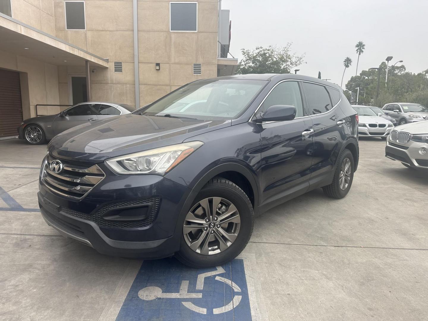 2014 Night Sky Pearl. /Gray Hyundai Santa Fe Sport 2.4 FWD (5XYZT3LB4EG) with an 2.4L L4 DOHC 16V engine, 6-Speed Automatic transmission, located at 30 S. Berkeley Avenue, Pasadena, CA, 91107, (626) 248-7567, 34.145447, -118.109398 - 2014 Hyundai Santa Fe Sport FWD 2.4: Versatility, Comfort, and Affordable Bad Credit Financing at Buy Here Pay Here Dealerships The 2014 Hyundai Santa Fe Sport FWD 2.4 is an exceptional midsize SUV that offers a balance of power, comfort, and affordability. It’s a top choice for families, daily - Photo#0