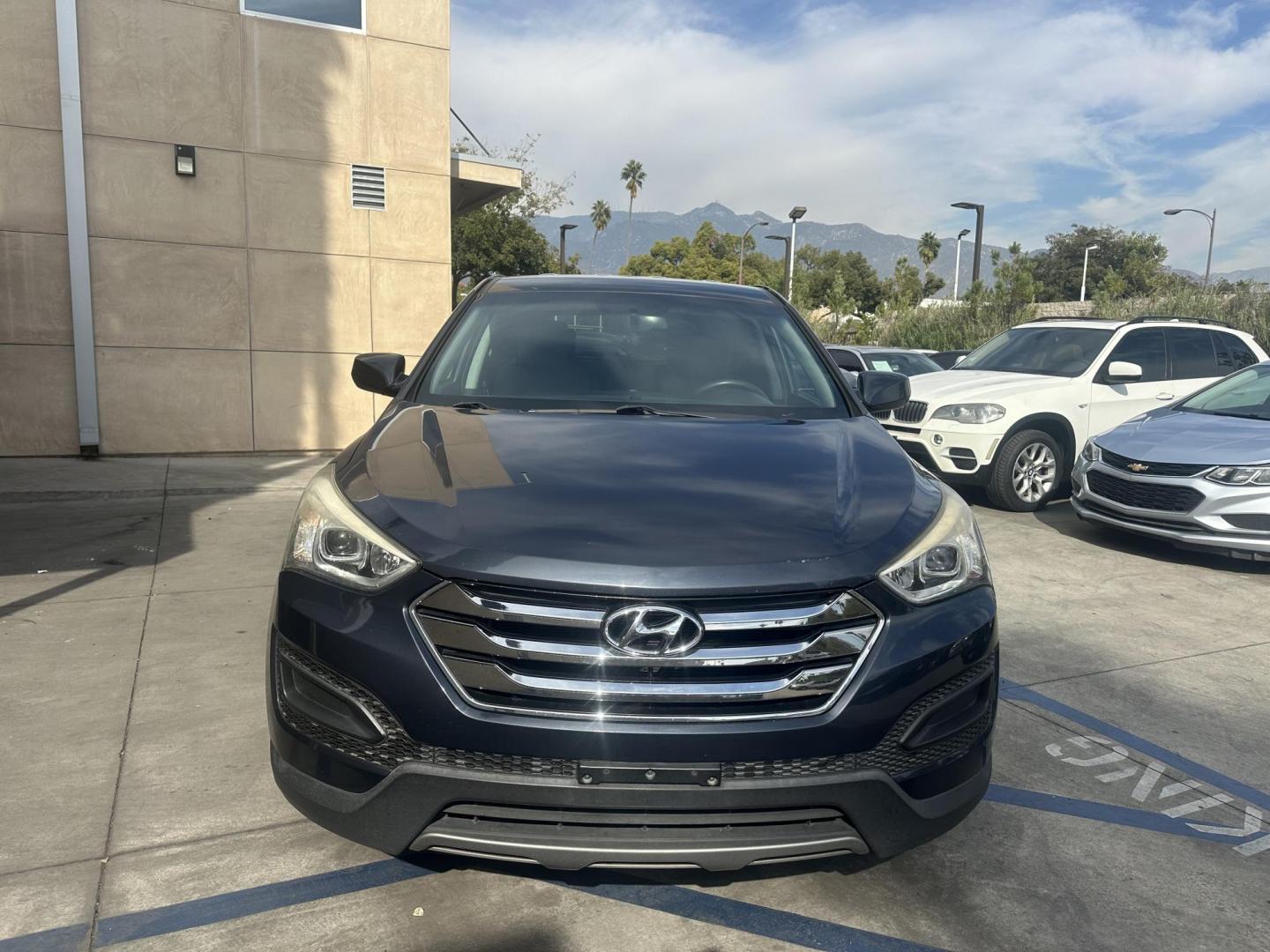 2014 Night Sky Pearl. /Gray Hyundai Santa Fe Sport 2.4 FWD (5XYZT3LB4EG) with an 2.4L L4 DOHC 16V engine, 6-Speed Automatic transmission, located at 30 S. Berkeley Avenue, Pasadena, CA, 91107, (626) 248-7567, 34.145447, -118.109398 - 2014 Hyundai Santa Fe Sport FWD 2.4: Versatility, Comfort, and Affordable Bad Credit Financing at Buy Here Pay Here Dealerships The 2014 Hyundai Santa Fe Sport FWD 2.4 is an exceptional midsize SUV that offers a balance of power, comfort, and affordability. It’s a top choice for families, daily - Photo#7