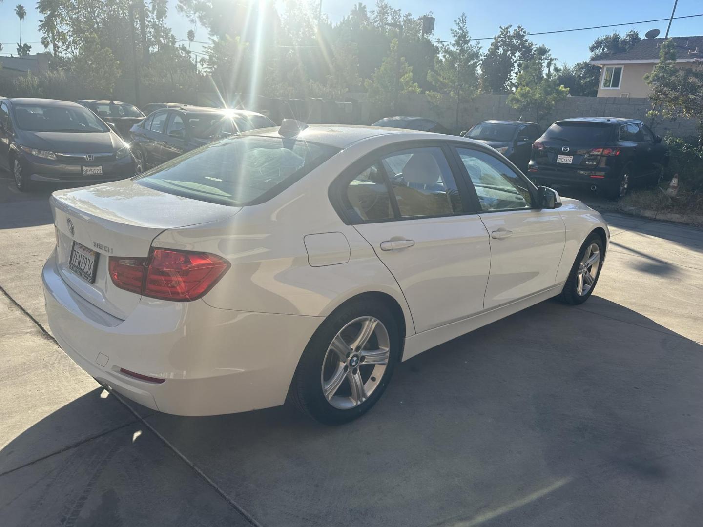 2014 Alpine White /Tan BMW 3-Series 320i Sedan (WBA3B1G59EN) with an 2.0L L4 DOHC 16V engine, Automatic transmission, located at 30 S. Berkeley Avenue, Pasadena, CA, 91107, (626) 248-7567, 34.145447, -118.109398 - Looking for a sleek, reliable, and luxurious vehicle with flexible financing options? Check out this 2014 BMW 320i at our Buy Here Pay Here Los Angeles dealership. This high-performance sedan combines BMW’s signature driving dynamics with comfort and cutting-edge features. Whether you're building - Photo#2