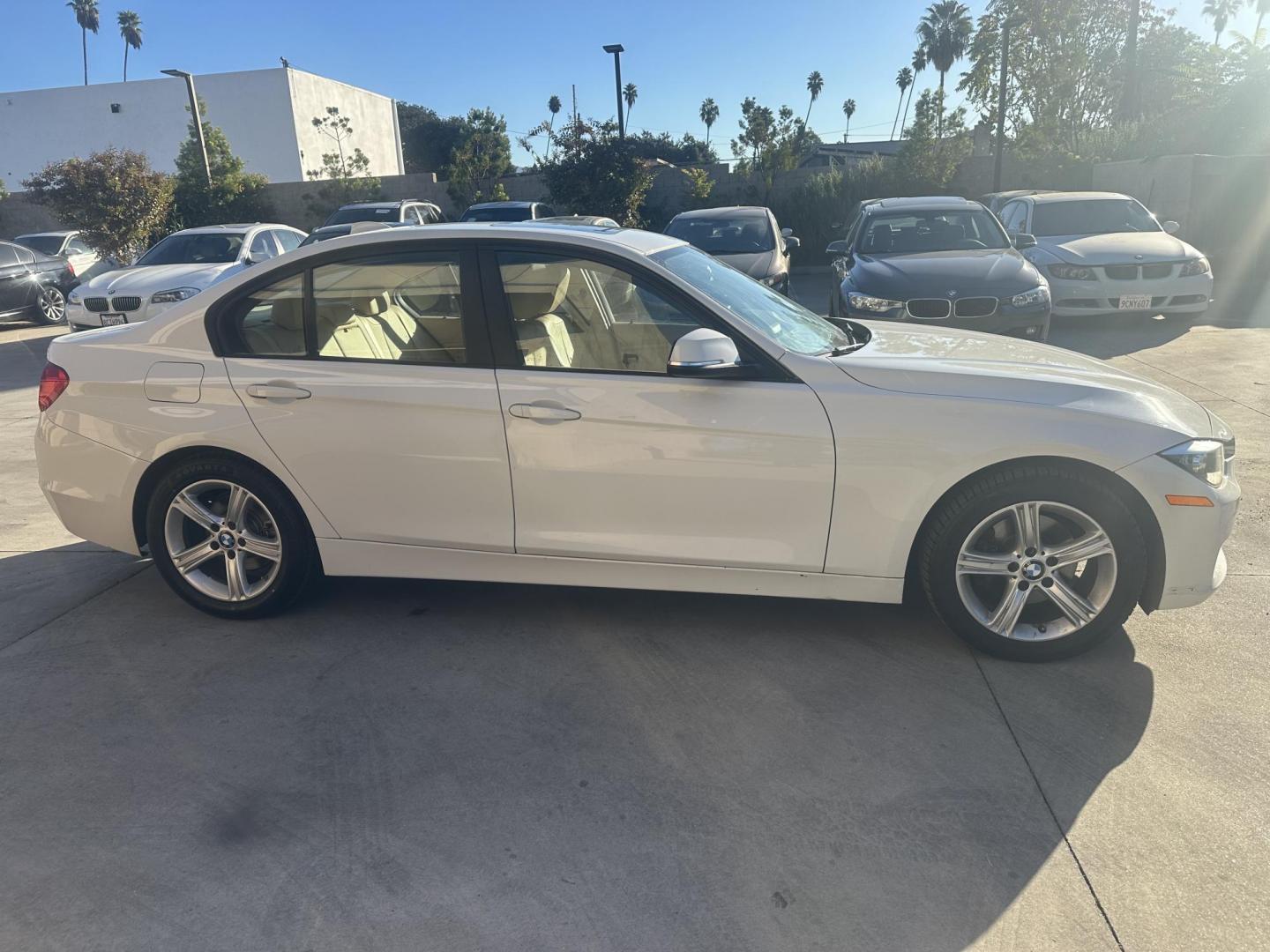 2014 Alpine White /Tan BMW 3-Series 320i Sedan (WBA3B1G59EN) with an 2.0L L4 DOHC 16V engine, Automatic transmission, located at 30 S. Berkeley Avenue, Pasadena, CA, 91107, (626) 248-7567, 34.145447, -118.109398 - Looking for a sleek, reliable, and luxurious vehicle with flexible financing options? Check out this 2014 BMW 320i at our Buy Here Pay Here Los Angeles dealership. This high-performance sedan combines BMW’s signature driving dynamics with comfort and cutting-edge features. Whether you're building - Photo#4