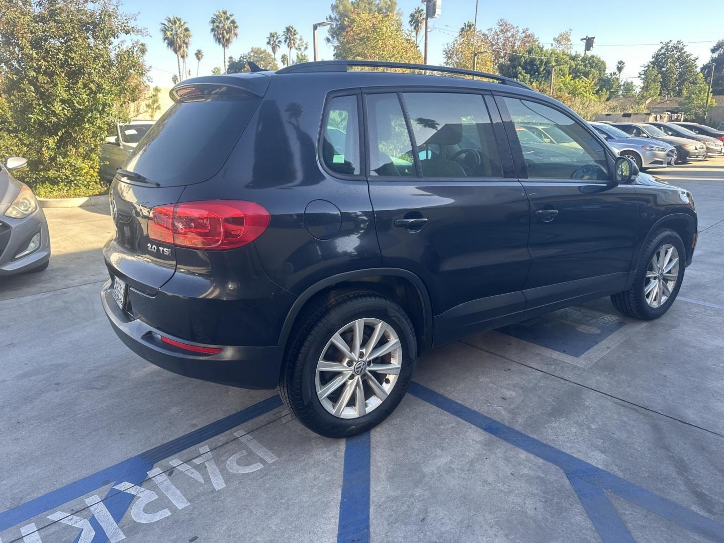 2015 Black /Tan Volkswagen Tiguan S (WVGAV7AX2FW) with an 2.0L L4 DOHC 16V TURBO engine, 6-Speed Automatic transmission, located at 30 S. Berkeley Avenue, Pasadena, CA, 91107, (626) 248-7567, 34.145447, -118.109398 - Looking for a compact SUV that offers a blend of performance, comfort, and advanced features? The 2015 Volkswagen Tiguan might be the perfect choice for you. At our Buy Here Pay Here Los Angeles dealership, we simplify the buying process by offering in-house financing options tailored to different f - Photo#3