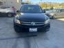 2015 Black /Tan Volkswagen Tiguan S (WVGAV7AX2FW) with an 2.0L L4 DOHC 16V TURBO engine, 6-Speed Automatic transmission, located at 30 S. Berkeley Avenue, Pasadena, CA, 91107, (626) 248-7567, 34.145447, -118.109398 - Looking for a compact SUV that offers a blend of performance, comfort, and advanced features? The 2015 Volkswagen Tiguan might be the perfect choice for you. At our Buy Here Pay Here Los Angeles dealership, we simplify the buying process by offering in-house financing options tailored to different f - Photo#4