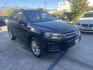 2015 Black /Tan Volkswagen Tiguan S (WVGAV7AX2FW) with an 2.0L L4 DOHC 16V TURBO engine, 6-Speed Automatic transmission, located at 30 S. Berkeley Avenue, Pasadena, CA, 91107, (626) 248-7567, 34.145447, -118.109398 - Looking for a compact SUV that offers a blend of performance, comfort, and advanced features? The 2015 Volkswagen Tiguan might be the perfect choice for you. At our Buy Here Pay Here Los Angeles dealership, we simplify the buying process by offering in-house financing options tailored to different f - Photo#6