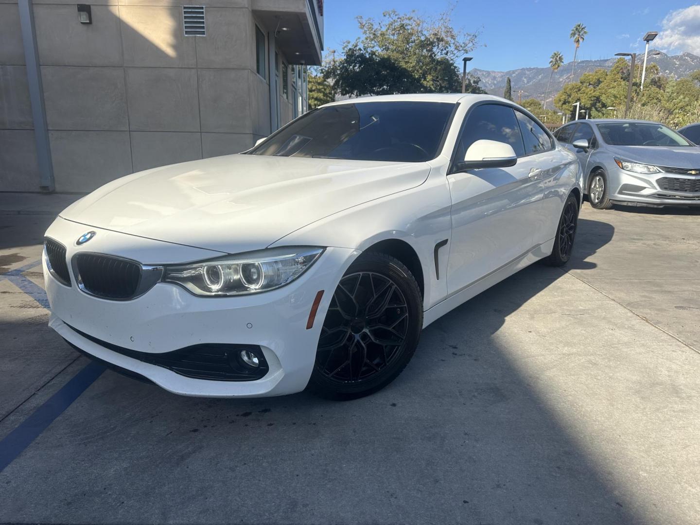 2014 Alpine White /Black BMW 4-Series 428i coupe (WBA3N7C59EF) with an 2.0L L4 DOHC 16V engine, Automatic transmission, located at 30 S. Berkeley Avenue, Pasadena, CA, 91107, (626) 248-7567, 34.145447, -118.109398 - Looking for a sporty, luxury coupe that exudes performance and style? The 2014 BMW 4-Series 428i Coupe might be the perfect vehicle for you. At our Buy Here Pay Here Los Angeles dealership, we simplify the buying process with in-house financing options designed to accommodate a variety of credit sit - Photo#1