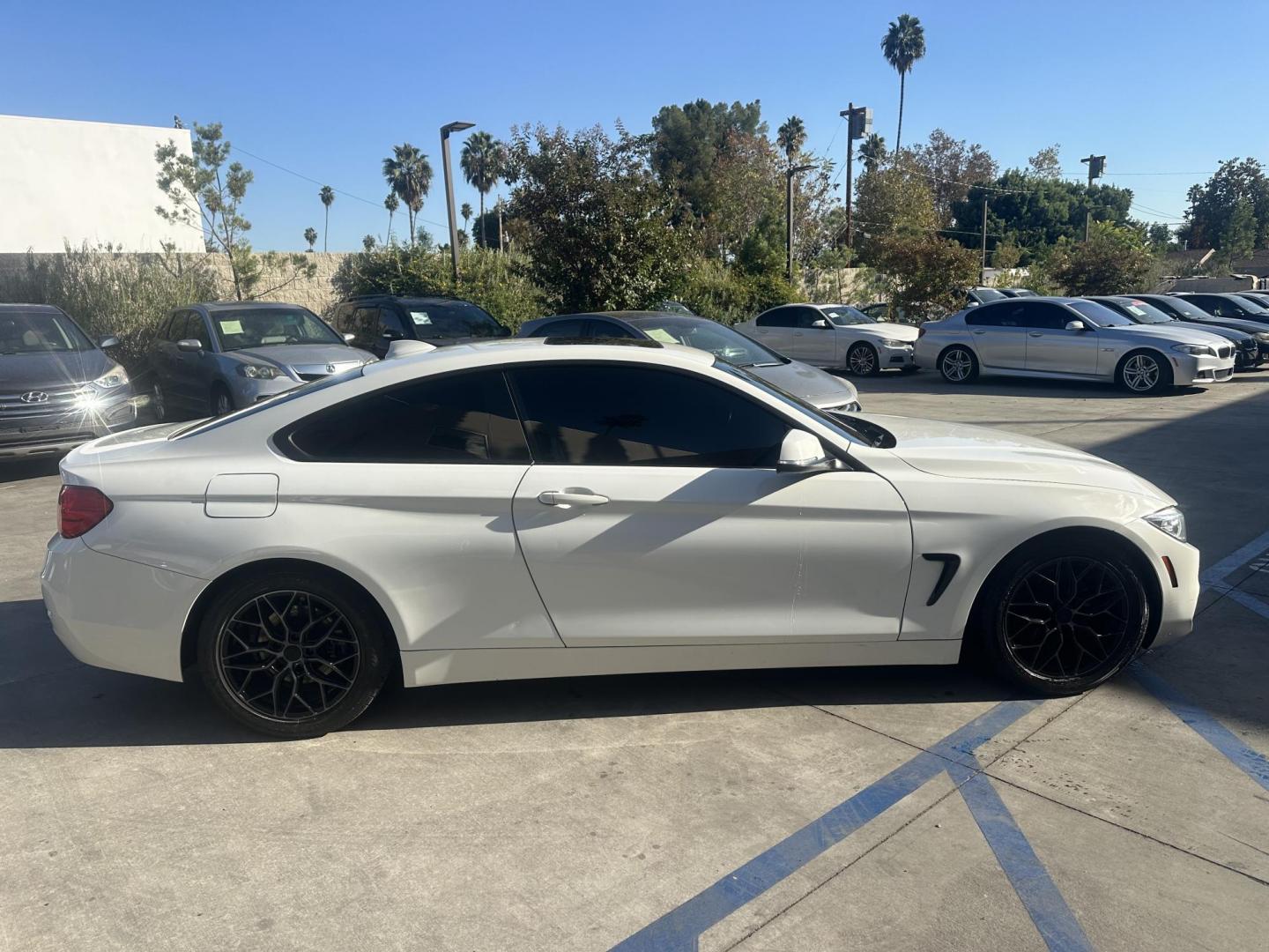 2014 Alpine White /Black BMW 4-Series 428i coupe (WBA3N7C59EF) with an 2.0L L4 DOHC 16V engine, Automatic transmission, located at 30 S. Berkeley Avenue, Pasadena, CA, 91107, (626) 248-7567, 34.145447, -118.109398 - Looking for a sporty, luxury coupe that exudes performance and style? The 2014 BMW 4-Series 428i Coupe might be the perfect vehicle for you. At our Buy Here Pay Here Los Angeles dealership, we simplify the buying process with in-house financing options designed to accommodate a variety of credit sit - Photo#6