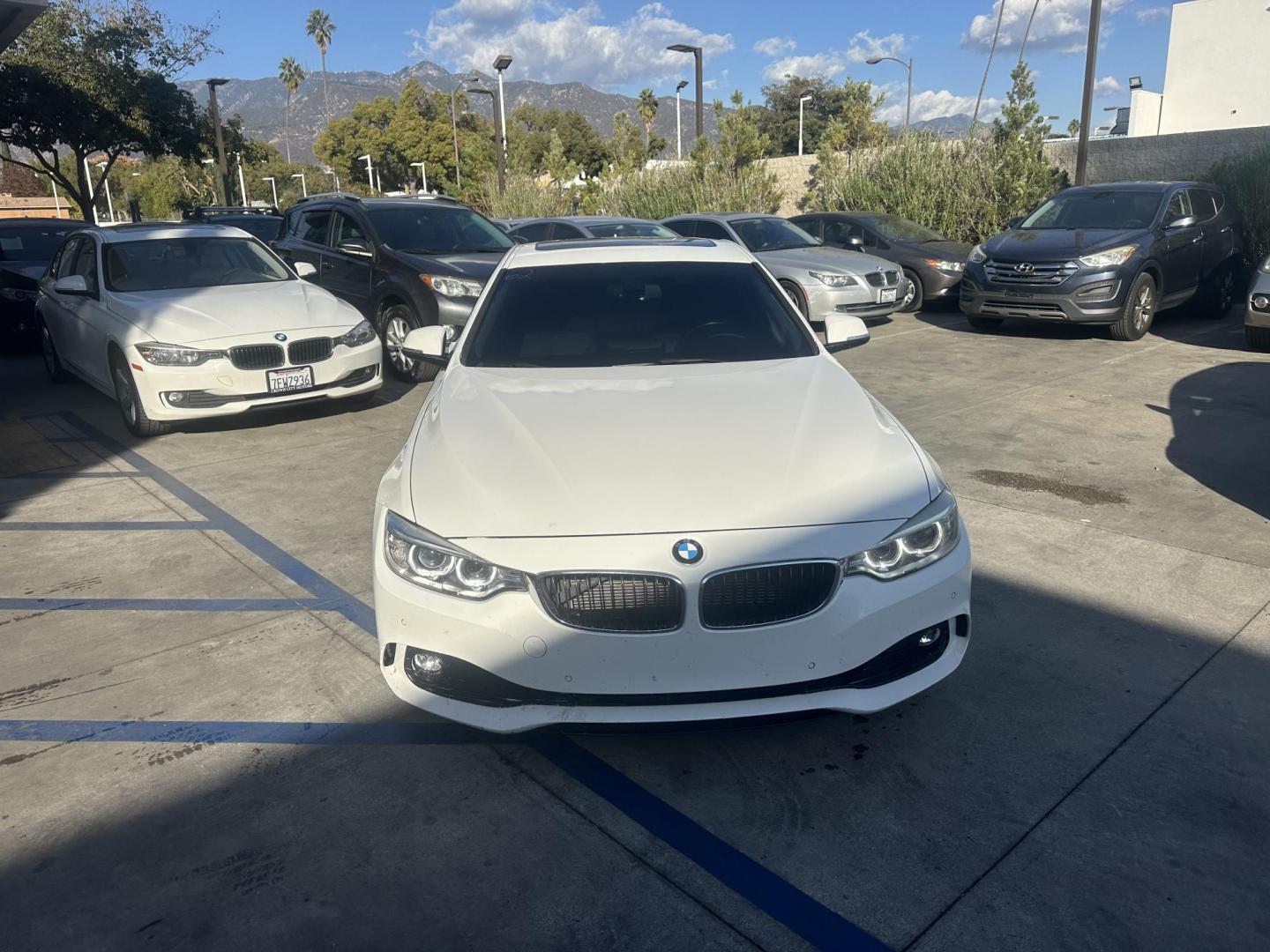 2014 Alpine White /Black BMW 4-Series 428i coupe (WBA3N7C59EF) with an 2.0L L4 DOHC 16V engine, Automatic transmission, located at 30 S. Berkeley Avenue, Pasadena, CA, 91107, (626) 248-7567, 34.145447, -118.109398 - Looking for a sporty, luxury coupe that exudes performance and style? The 2014 BMW 4-Series 428i Coupe might be the perfect vehicle for you. At our Buy Here Pay Here Los Angeles dealership, we simplify the buying process with in-house financing options designed to accommodate a variety of credit sit - Photo#7