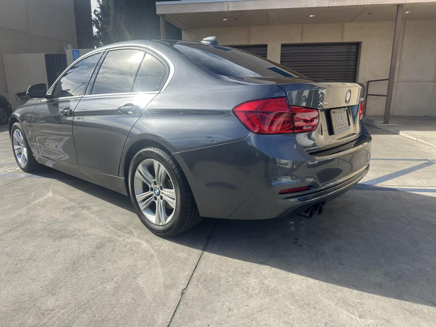 2017 Mineral Gray Metallic /Black BMW 3-Series 330i xDrive SULEV Sedan (WBA8D9C55HK) with an 3.0L L6 DOHC 24V engine, 8A transmission, located at 30 S. Berkeley Avenue, Pasadena, CA, 91107, (626) 248-7567, 34.145447, -118.109398 - XDrive!! Low Miles! Well Equipped! e 2017 BMW 330i xDrive combines luxury, performance, and efficiency. Powered by a turbocharged 2.0L 4-cylinder engine, it delivers 248 horsepower while maintaining a refined drive. With an EPA-rated 23 MPG in the city and 33 MPG on the highway, it's ideal for bot - Photo#2