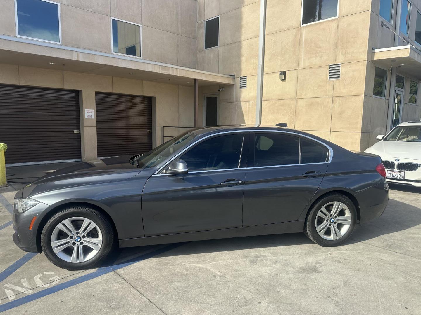 2017 Mineral Gray Metallic /Black BMW 3-Series 330i xDrive SULEV Sedan (WBA8D9C55HK) with an 3.0L L6 DOHC 24V engine, 8A transmission, located at 30 S. Berkeley Avenue, Pasadena, CA, 91107, (626) 248-7567, 34.145447, -118.109398 - XDrive!! Low Miles! Well Equipped! e 2017 BMW 330i xDrive combines luxury, performance, and efficiency. Powered by a turbocharged 2.0L 4-cylinder engine, it delivers 248 horsepower while maintaining a refined drive. With an EPA-rated 23 MPG in the city and 33 MPG on the highway, it's ideal for bot - Photo#1