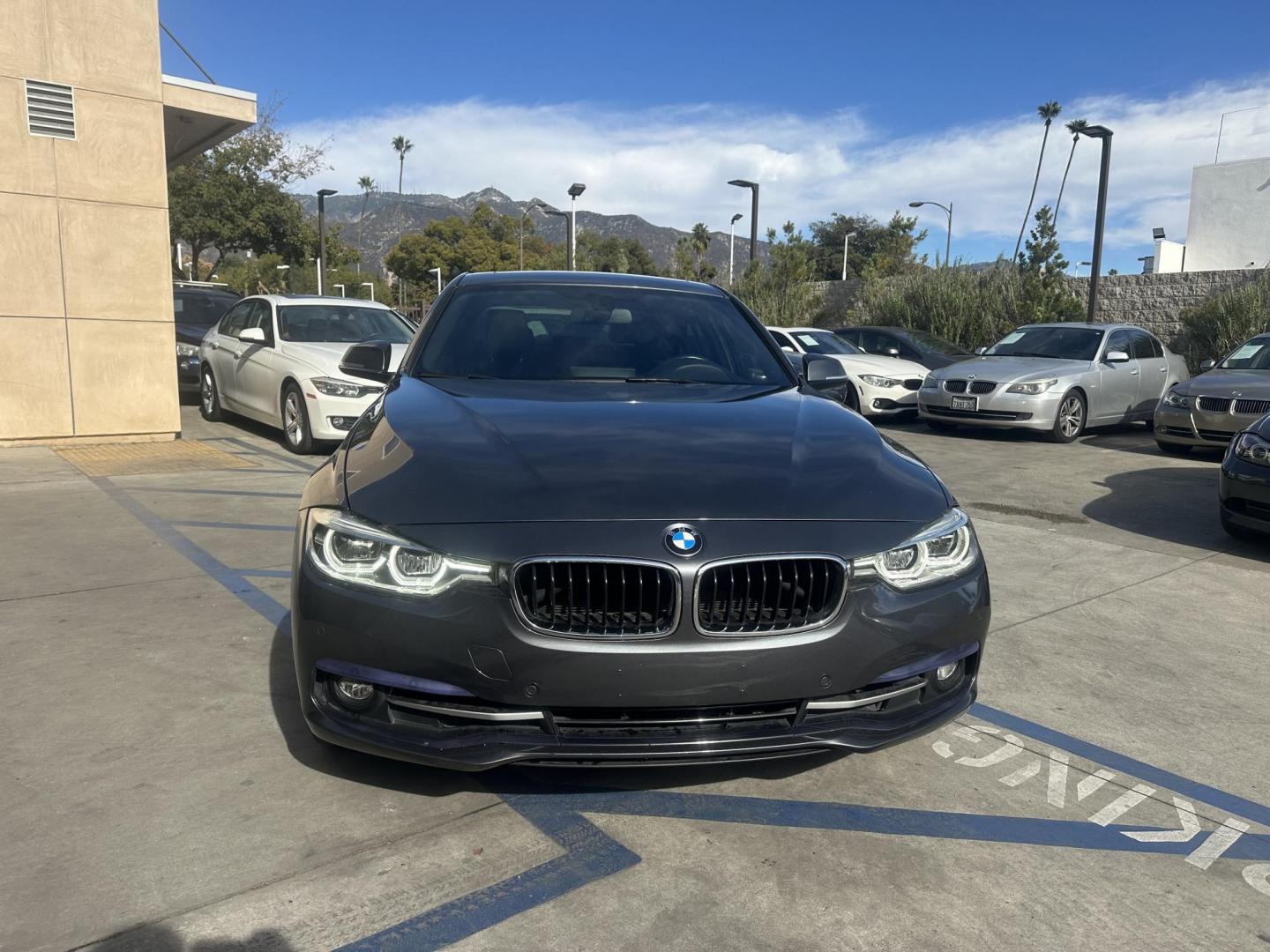 2017 Mineral Gray Metallic /Black BMW 3-Series 330i xDrive SULEV Sedan (WBA8D9C55HK) with an 3.0L L6 DOHC 24V engine, 8A transmission, located at 30 S. Berkeley Avenue, Pasadena, CA, 91107, (626) 248-7567, 34.145447, -118.109398 - XDrive!! Low Miles! Well Equipped! e 2017 BMW 330i xDrive combines luxury, performance, and efficiency. Powered by a turbocharged 2.0L 4-cylinder engine, it delivers 248 horsepower while maintaining a refined drive. With an EPA-rated 23 MPG in the city and 33 MPG on the highway, it's ideal for bot - Photo#5