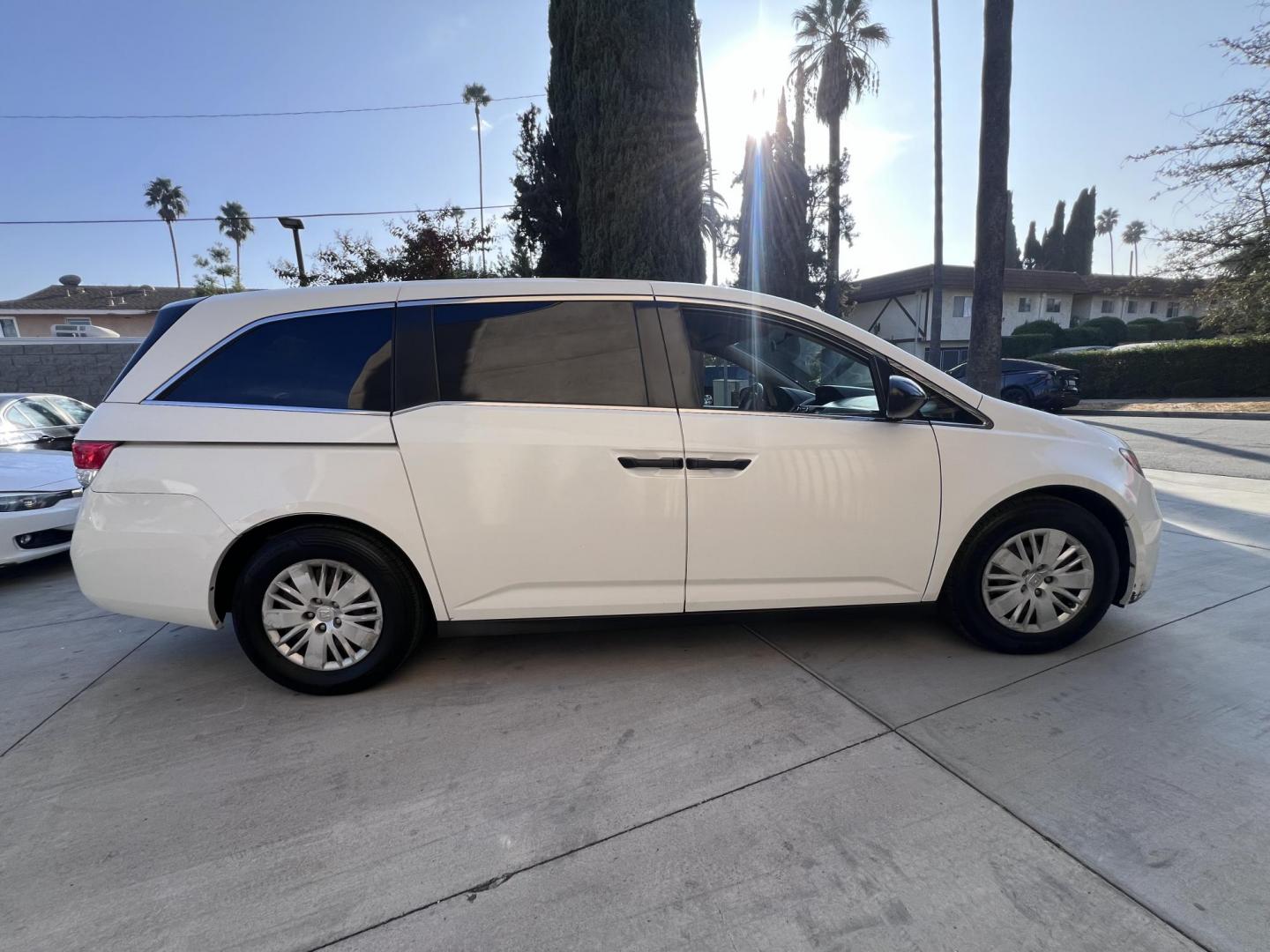 2015 White /Gray Honda Odyssey LX (5FNRL5H2XFB) with an 3.5L V6 SOHC 24V engine, 6-Speed Automatic transmission, located at 30 S. Berkeley Avenue, Pasadena, CA, 91107, (626) 248-7567, 34.145447, -118.109398 - Photo#1