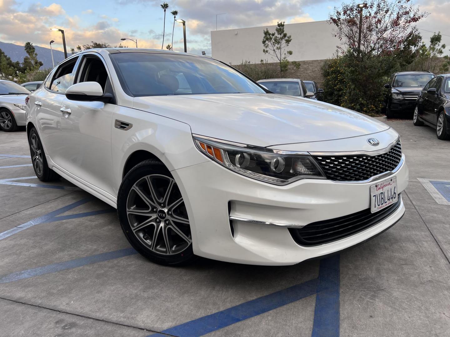 2016 White /Black Kia Optima EX (5XXGU4L3XGG) with an 2.4L L4 DOHC 16V engine, 6A transmission, located at 30 S. Berkeley Avenue, Pasadena, CA, 91107, (626) 248-7567, 34.145447, -118.109398 - Photo#2