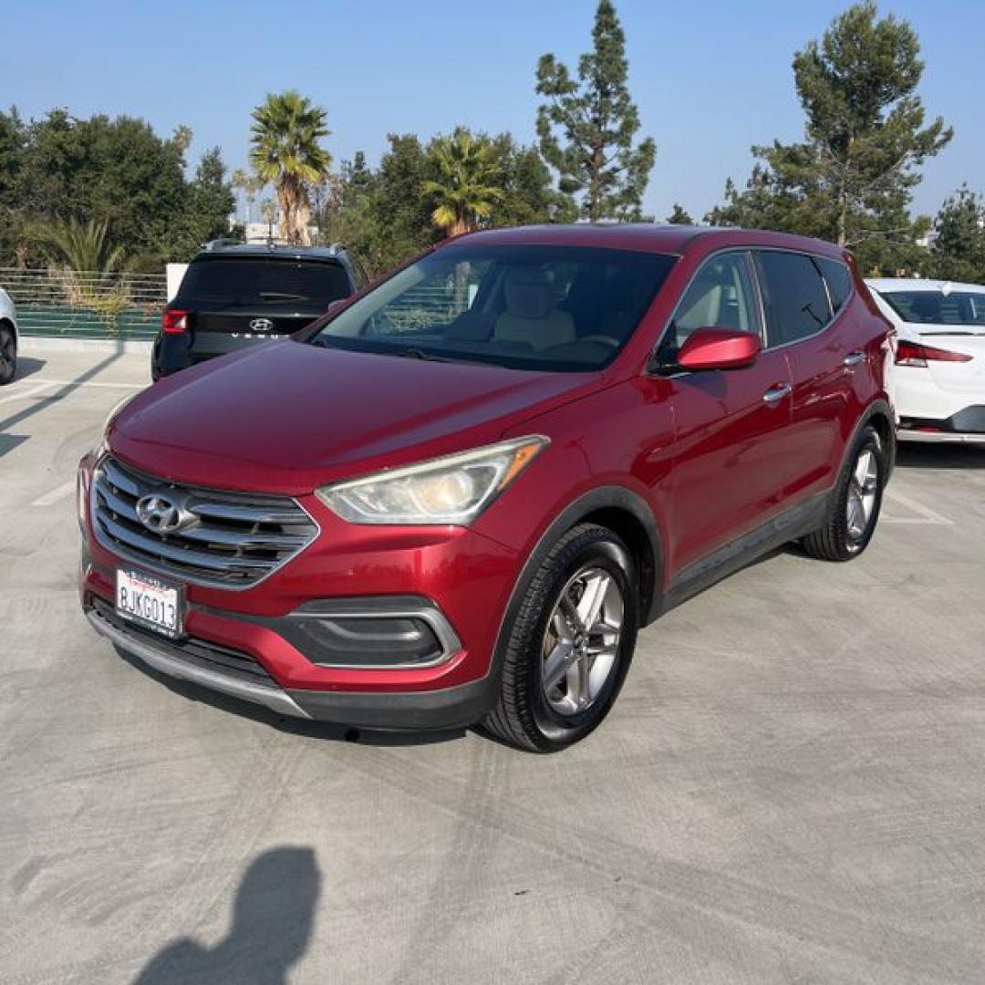 2018 Ruby Red /Black Hyundai Santa Fe Sport 2.4 AWD (5XYZTDLB2JG) with an 2.4L L4 DOHC 16V engine, 6A transmission, located at 30 S. Berkeley Avenue, Pasadena, CA, 91107, (626) 248-7567, 34.145447, -118.109398 - Photo#0