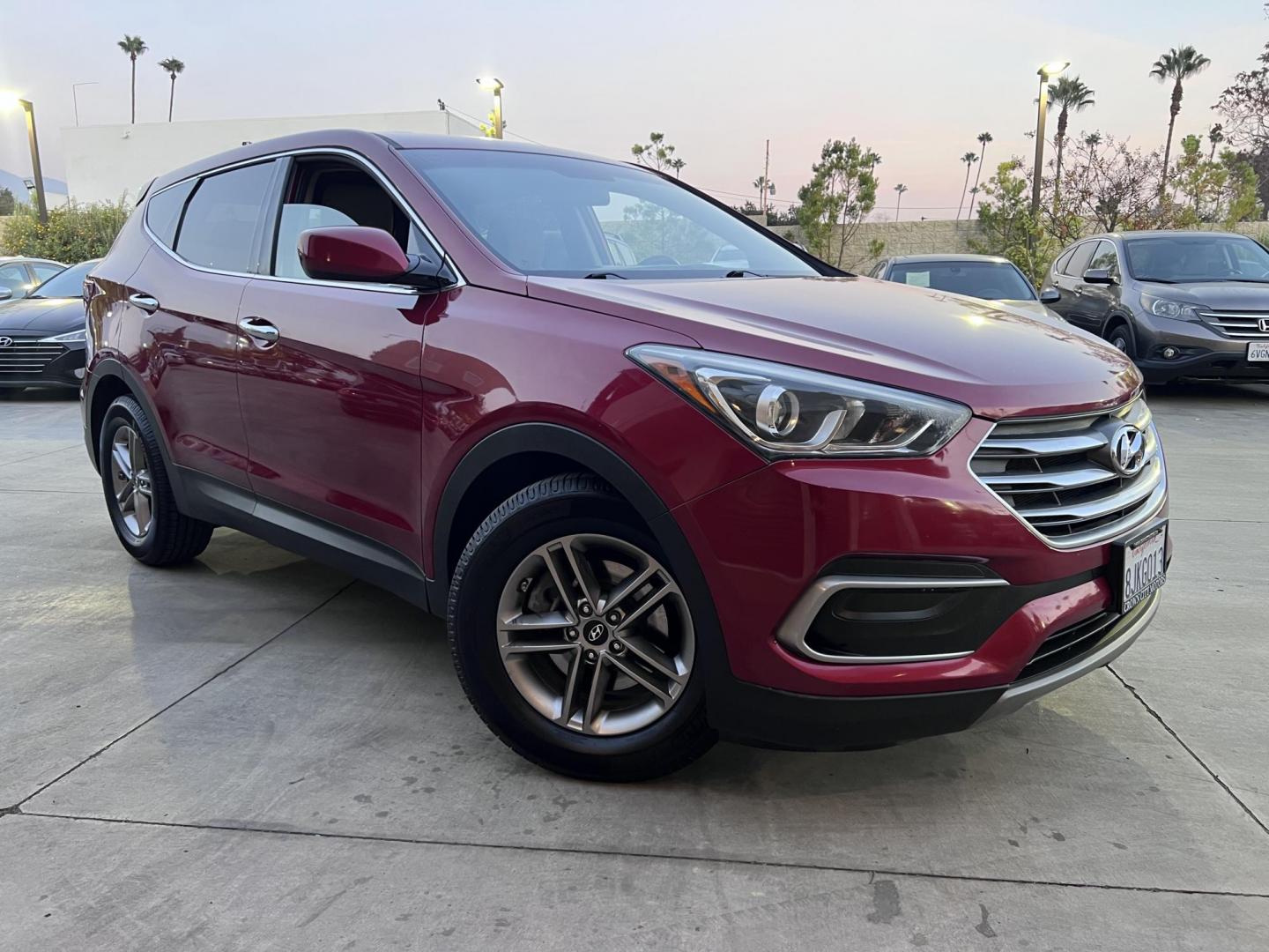 2018 Ruby Red /Black Hyundai Santa Fe Sport 2.4 AWD (5XYZTDLB2JG) with an 2.4L L4 DOHC 16V engine, 6A transmission, located at 30 S. Berkeley Avenue, Pasadena, CA, 91107, (626) 248-7567, 34.145447, -118.109398 - Photo#3