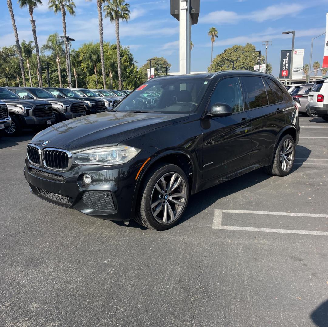 2016 Black /Black BMW X5 xDrive35i (5UXKR0C50G0) with an 3.0L L6 DOHC 24V engine, 8A transmission, located at 30 S. Berkeley Avenue, Pasadena, CA, 91107, (626) 248-7567, 34.145447, -118.109398 - Why the 2016 BMW X5 Stands Out The 2016 BMW X5 is a premium midsize SUV that delivers exceptional performance and luxury. With its black-on-black configuration, this X5 exudes elegance and power, making it perfect for any occasion. Whether you’re heading to work, chauffeuring the family, or embar - Photo#2