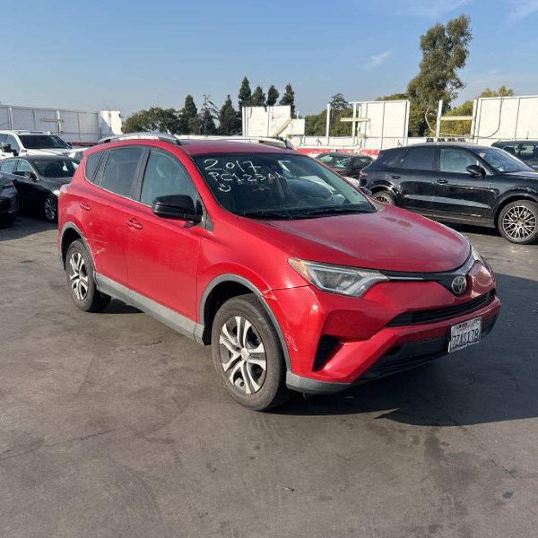 2017 Ruby Red /Gray Toyota RAV4 LE FWD (2T3ZFREV1HW) with an 2.5L L4 DOHC 16V engine, 6A transmission, located at 30 S. Berkeley Avenue, Pasadena, CA, 91107, (626) 248-7567, 34.145447, -118.109398 - 2017 Toyota RAV4: Reliable and Versatile SUV Available with Buy Here Pay Here Auto Loan Financing—Bad Credit? No Problem! Looking for a dependable, stylish, and feature-packed SUV that fits your lifestyle? The 2017 Toyota RAV4 is the perfect choice for drivers who value reliability, efficiency, - Photo#0