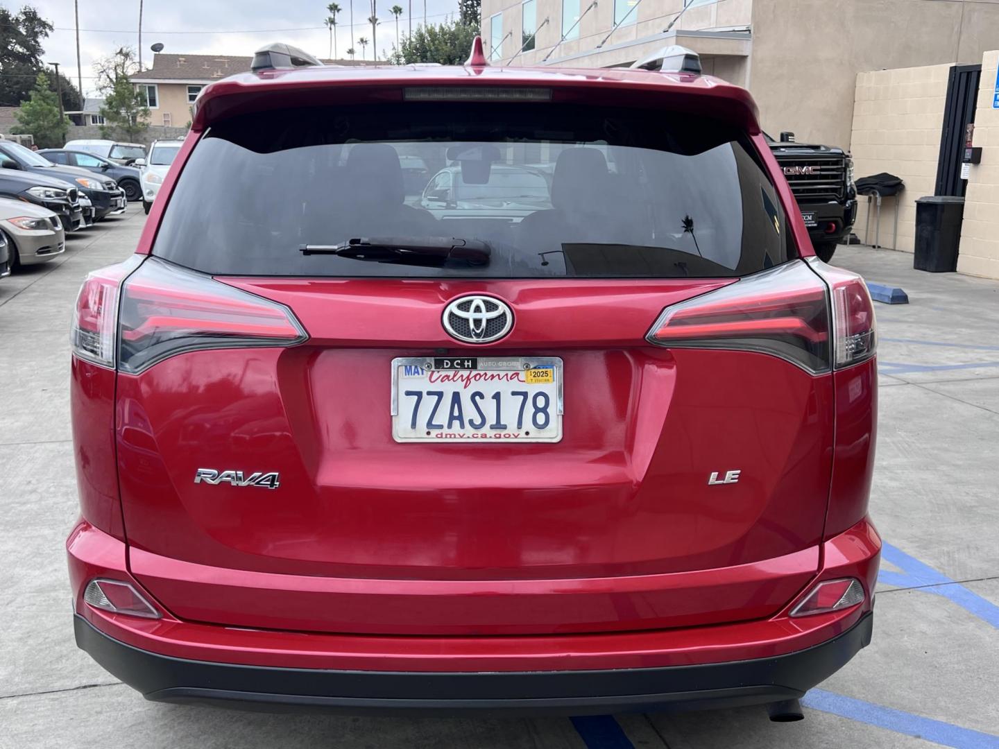 2017 Ruby Red /Gray Toyota RAV4 LE FWD (2T3ZFREV1HW) with an 2.5L L4 DOHC 16V engine, 6A transmission, located at 30 S. Berkeley Avenue, Pasadena, CA, 91107, (626) 248-7567, 34.145447, -118.109398 - 2017 Toyota RAV4: Reliable and Versatile SUV Available with Buy Here Pay Here Auto Loan Financing—Bad Credit? No Problem! Looking for a dependable, stylish, and feature-packed SUV that fits your lifestyle? The 2017 Toyota RAV4 is the perfect choice for drivers who value reliability, efficiency, - Photo#2