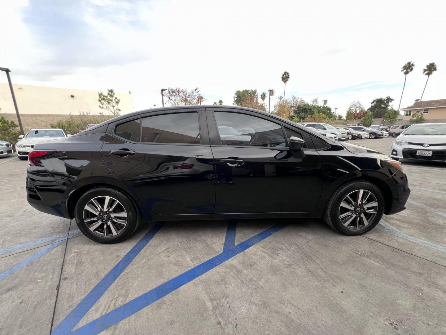 2021 Black /Black Nissan Versa SV (3N1CN8EV0ML) with an 1.6L L4 DOHC 16V engine, CVT transmission, located at 30 S. Berkeley Avenue, Pasadena, CA, 91107, (626) 248-7567, 34.145447, -118.109398 - 021 Nissan Versa SV: The Perfect Blend of Style, Efficiency, and Affordability If you’re searching for a reliable, fuel-efficient, and stylish compact sedan, the 2021 Nissan Versa SV checks all the boxes. This vehicle offers a modern design, advanced technology features, and an impressive perform - Photo#4